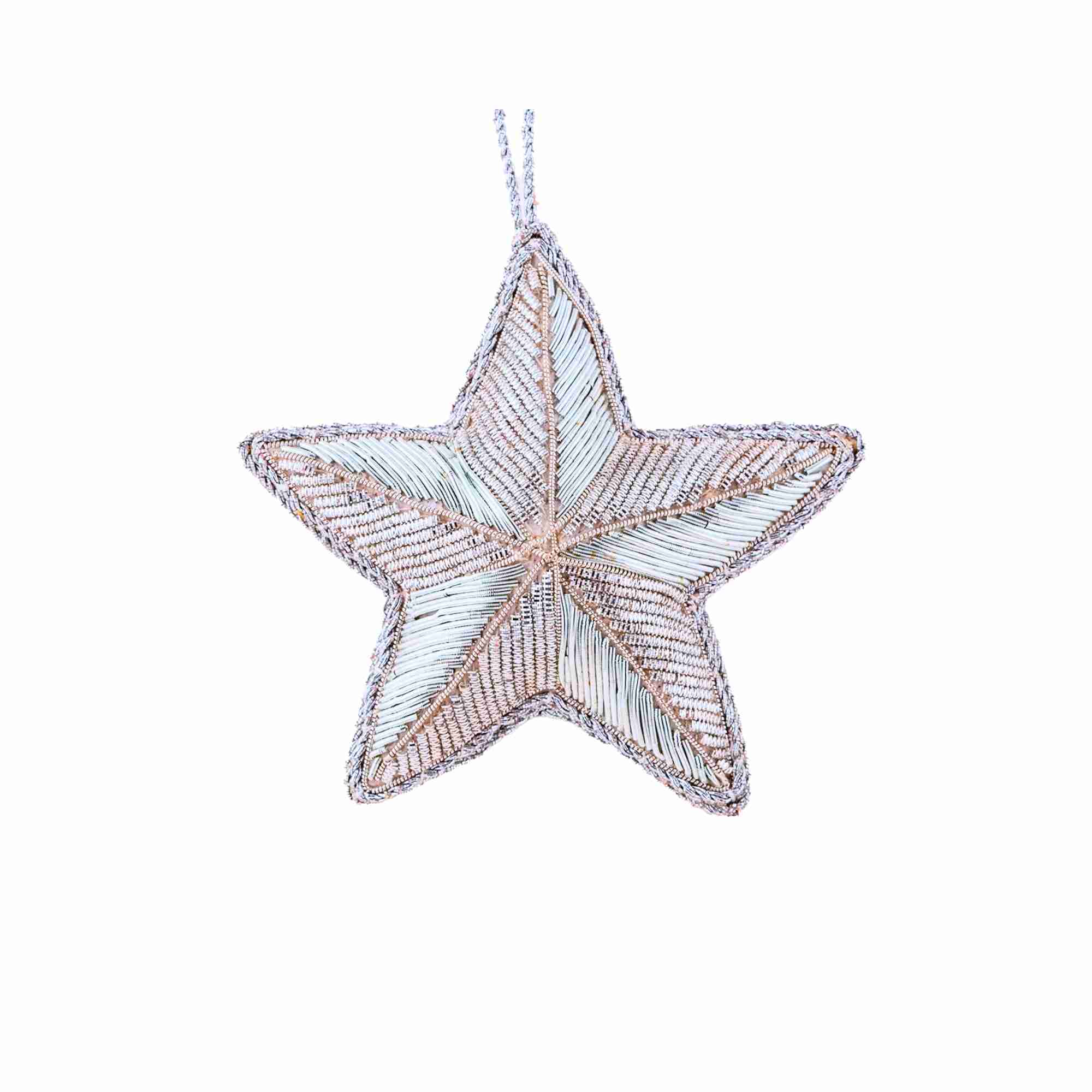 Star-shaped decorative ornament with a white and gold pattern on a white background