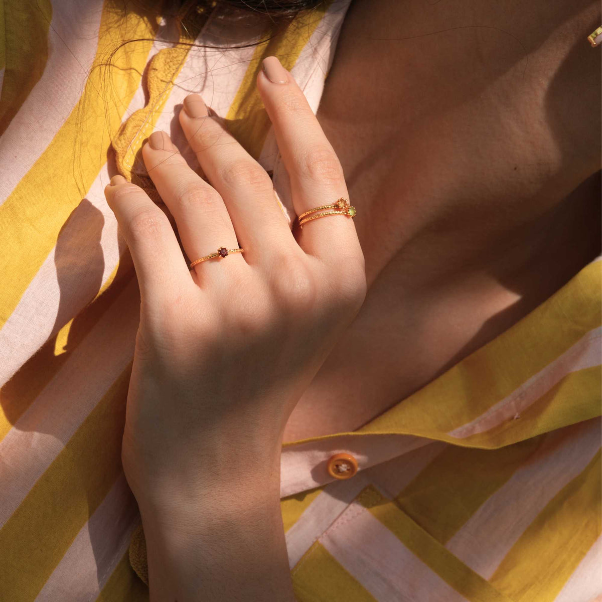 Delicate Vintage Aqua Chalcedony Dotted Band Ring Gold — Hand wearing a gold ring with an aqua chalcedony gemstone. By Protsaah Zurich.