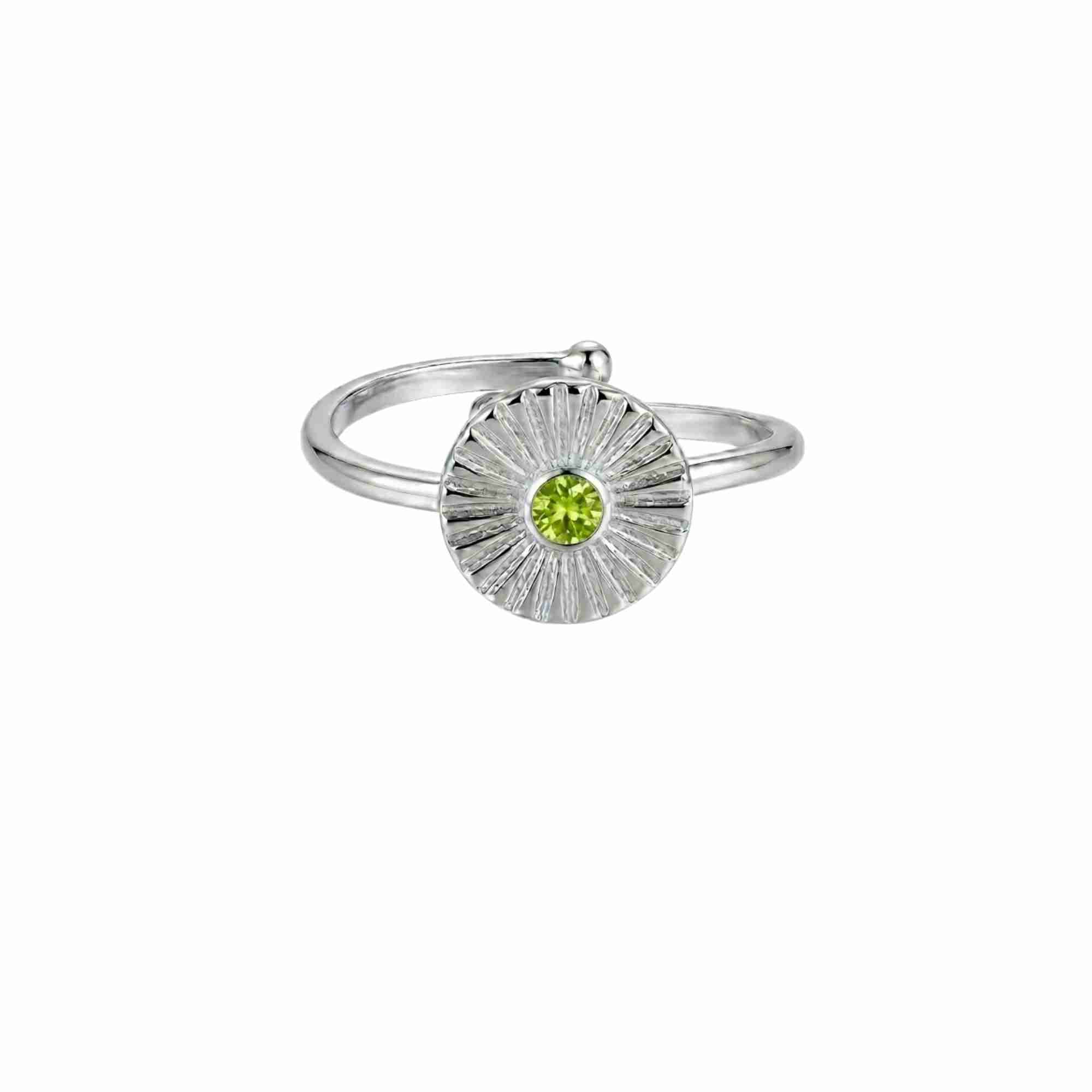 Front view of Delicate Vintage Peridot Fluted Medallion Coin Ring in 925 silver, showing the centered round green peridot gemstone, radiant fluted starburst medallion disc, and smooth open-back adjustable silver band.