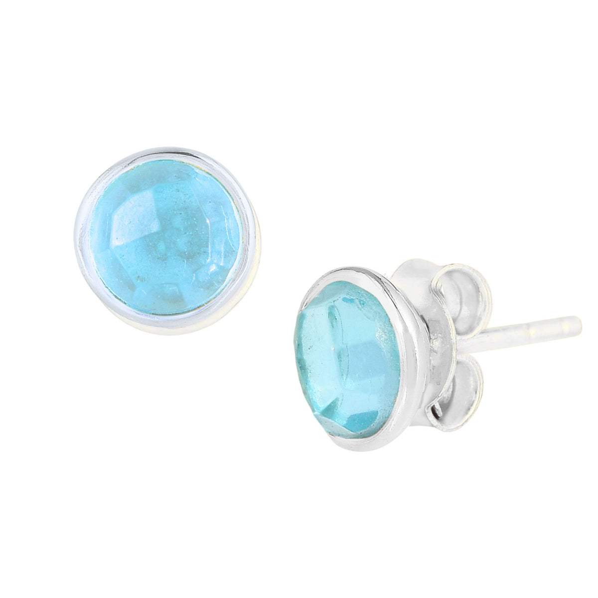 Round faceted 6mm blue topaz domed stud earrings in a silver collet on a white background