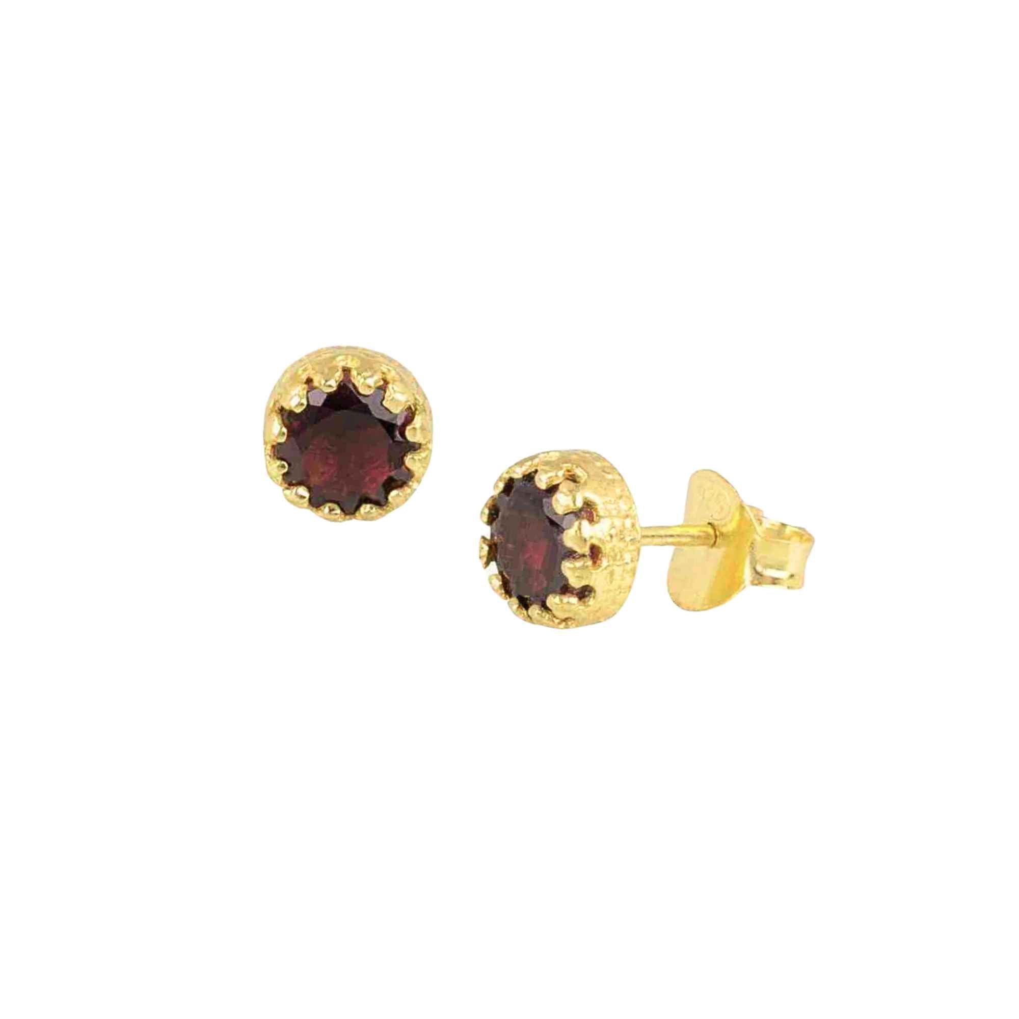 Garnet Crown Stud Earrings in gold against a plain white background, showcasing the round faceted rich pomegranate-red Garnet gemstones nestled inside handcrafted royal crown-style decorative bezel prongs in warm 22K gold vermeil over recycled silver with secure post-and-butterfly backs by Protsaah Zurich.