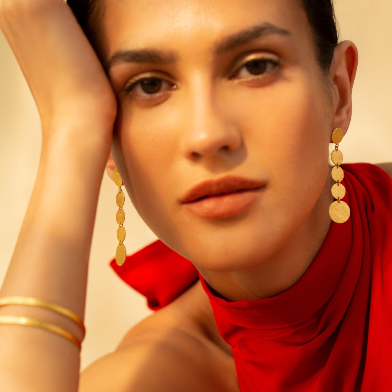 Shimmering Disks Graduating Statement Earrings Gold