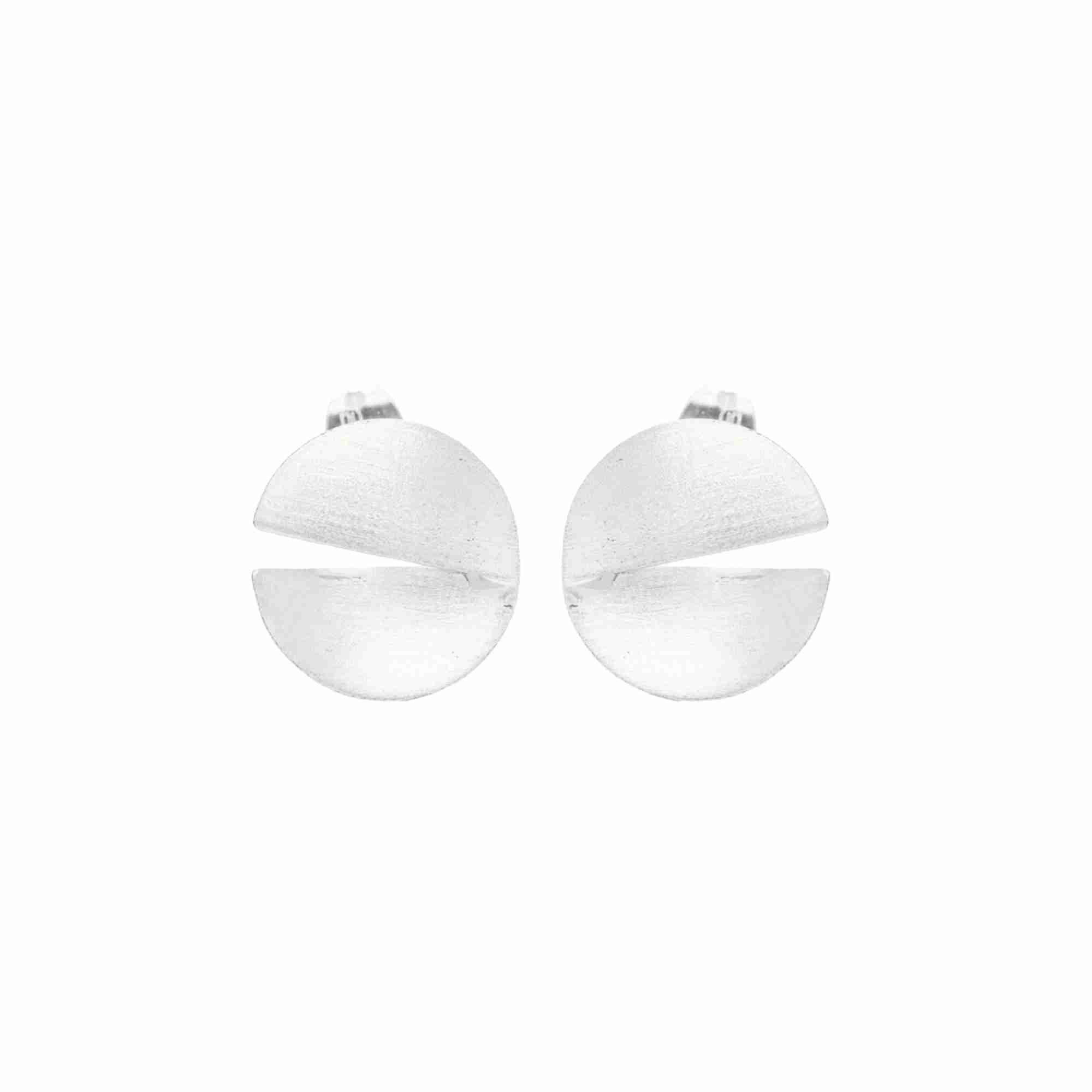 Sculptural Silver Disc Studs; circular folded earrings in recycled silver with a brushed-satin finish, artisanal statement jewelry by Protsaah Zurich.
