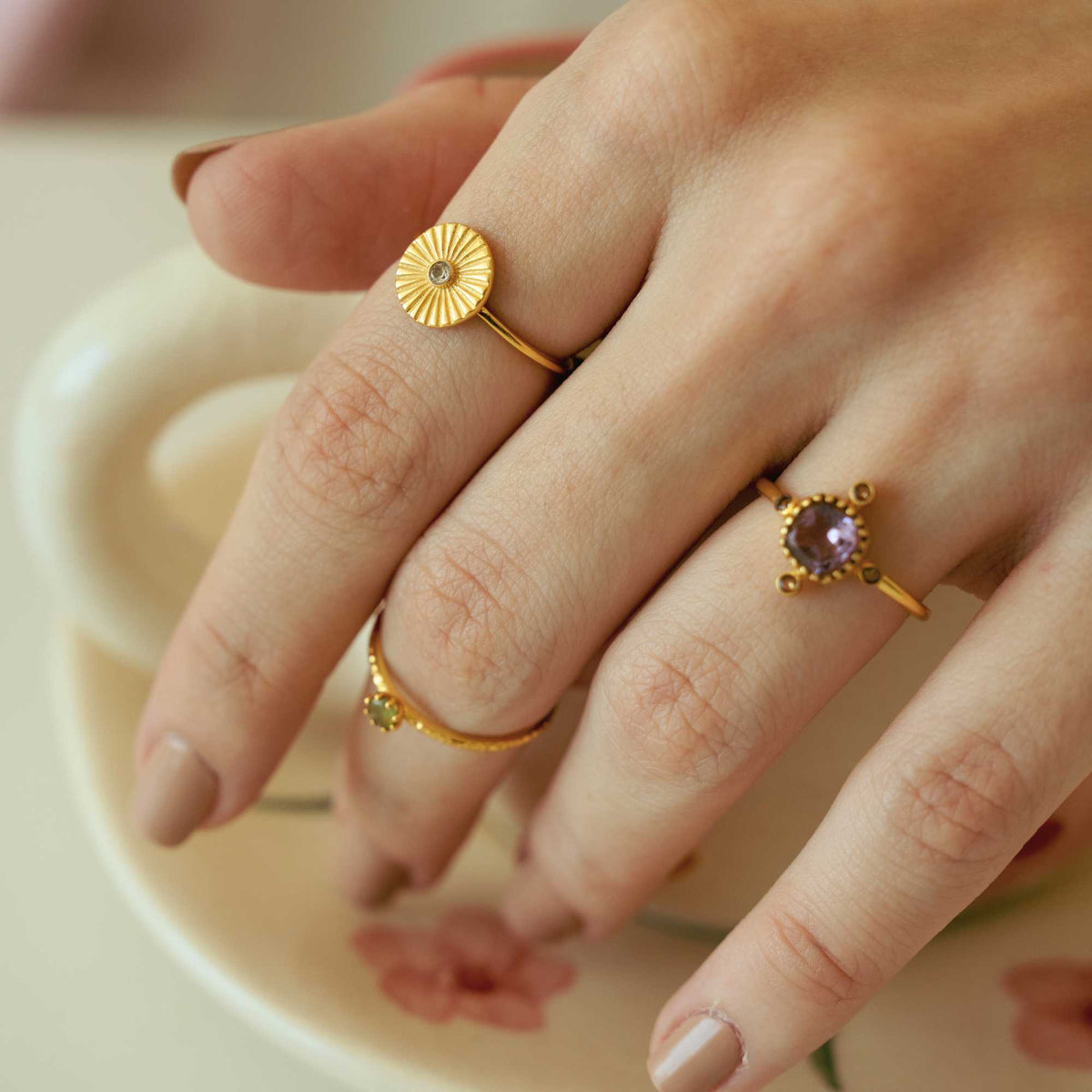 Delicate Vintage Aqua Chalcedony Dotted Band Ring Gold — Hand wearing a gold ring with an aqua chalcedony gemstone. By Protsaah Zurich.