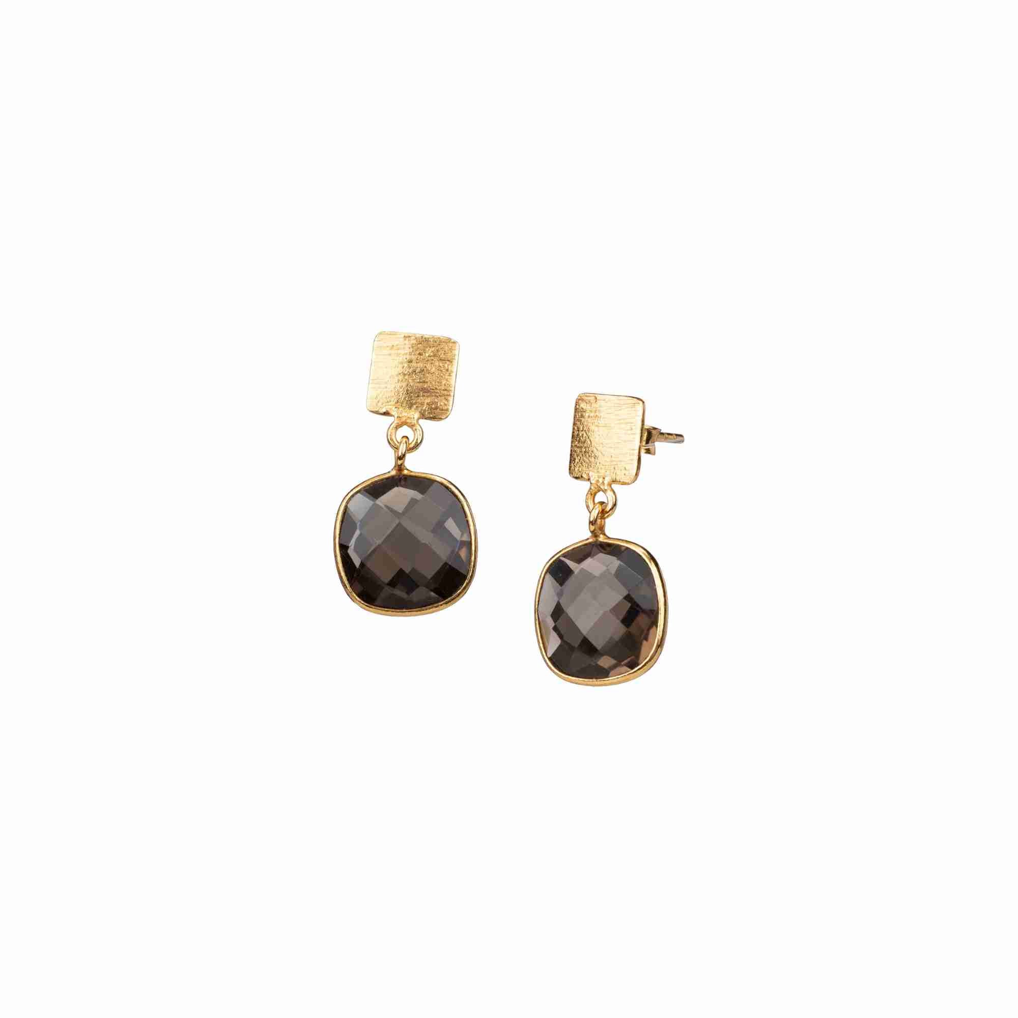 Product photography of Geo Glam Cushion-Cut Smoky Quartz Drop Earrings Gold, highlighting the faceted square translucent brown gemstone suspended from a hand-textured matte gold square post — Protsaah Zurich.
