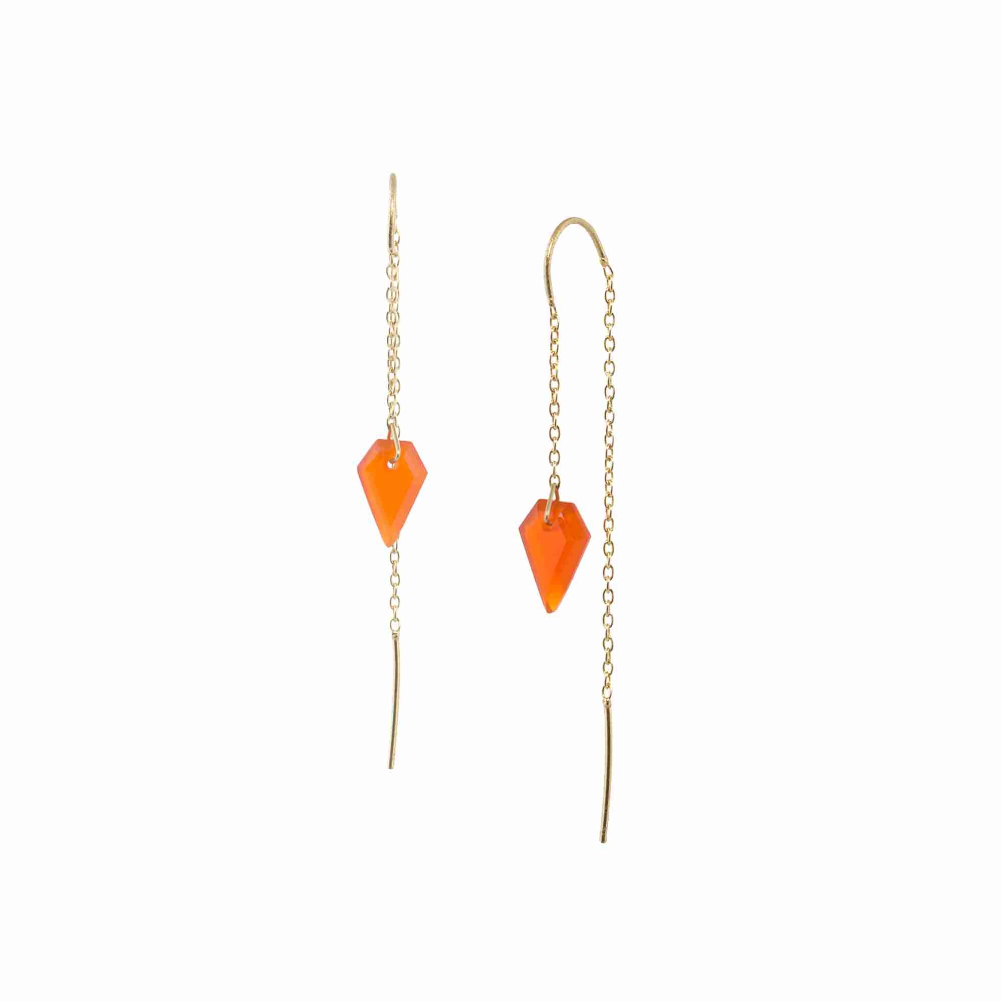 Product photography of Geo Glam Diamond-Cut Carnelian Threader Earrings Gold, highlighting the faceted elongated diamond-shaped orange gemstone suspended from a fine gold pull-through chain — Protsaah Zurich.