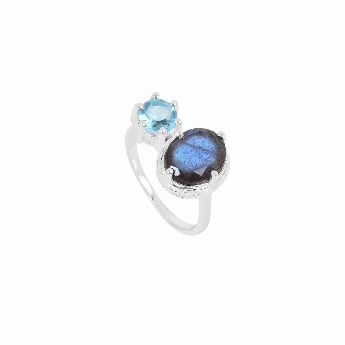 Protsaah Zurich - Angled profile view of Kaleidoscope Labradorite & Blue Topaz Toi et Moi Cocktail Ring showing hand-brushed textured sterling silver bezel settings and sleek adjustable band.