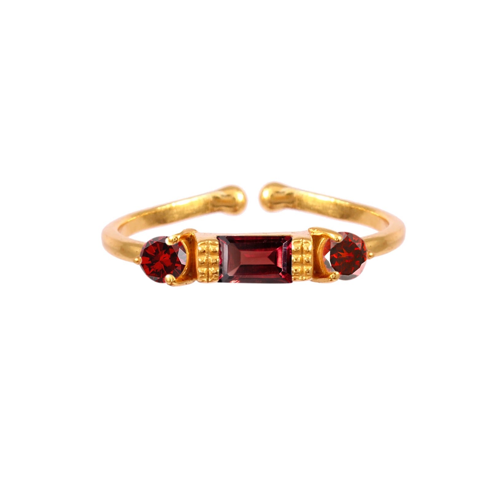 Front-facing view of the Delicate Vintage Garnet Three-Stone Ring featuring a central baguette-cut garnet flanked by two round side stones on a thin open-shank gold band.