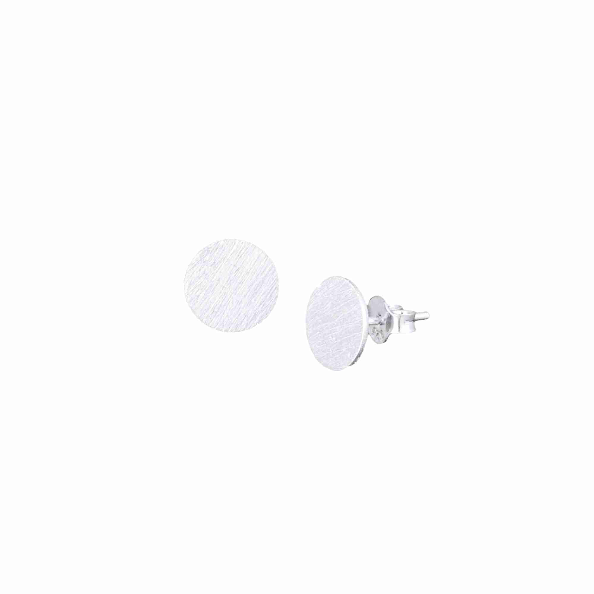 Shimmering Disks Silver Studs; minimalist circular earrings with a signature brushed-satin 92.5 recycled silver finish.