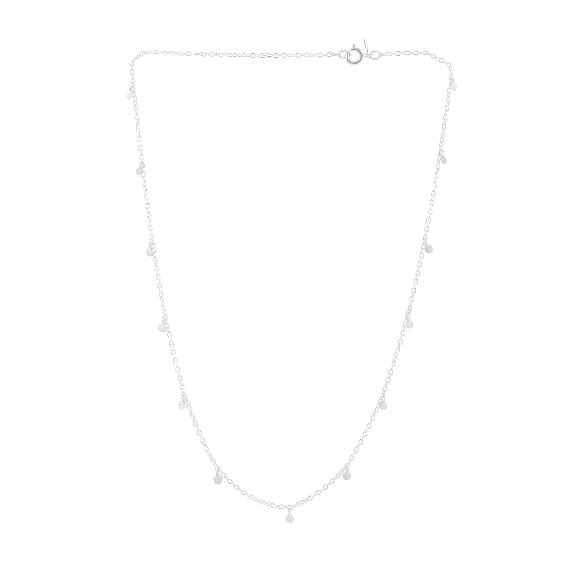 Constellation disc chain necklace in silver with tiny hand-brushed discs on a fine chain on a white background