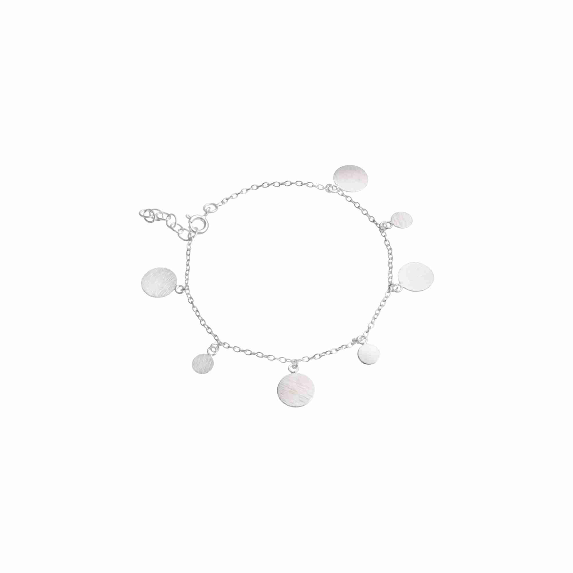 Shimmering Disks Silver Chain Bracelet; delicate bracelet featuring textured circular disks and a signature brushed-satin finish over 92.5 recycled silver.