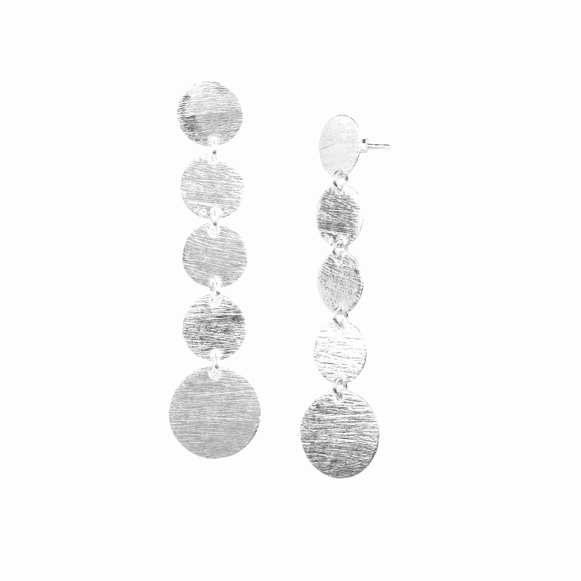Shimmering Disks Silver Statement Earrings; architectural graduating multi-disk cascade design with a signature brushed-satin 92.5 recycled silver finish.