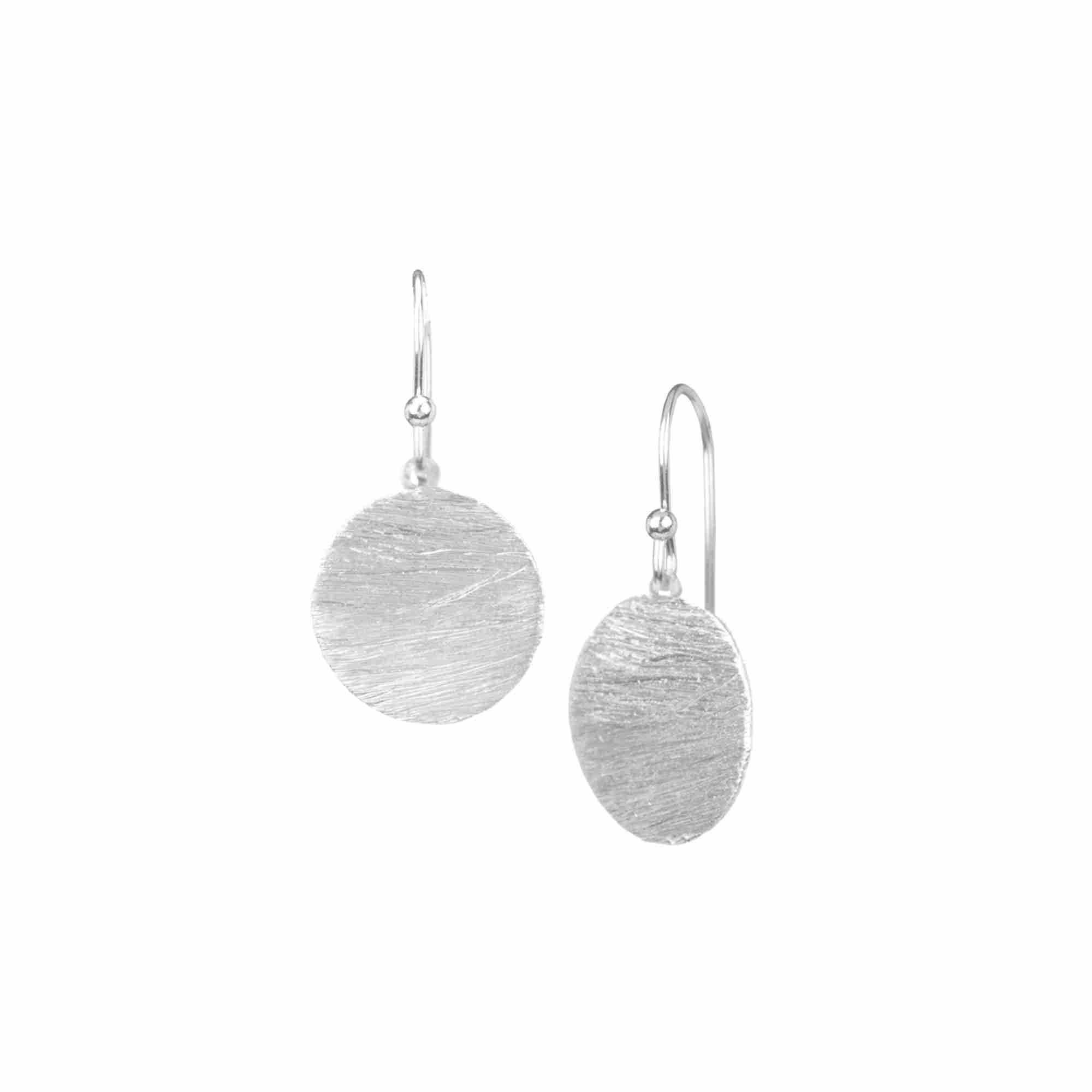 Shimmering Disks Silver Medium Drop Earrings; minimalist circular coin drops with a signature brushed-satin 92.5 recycled silver finish.