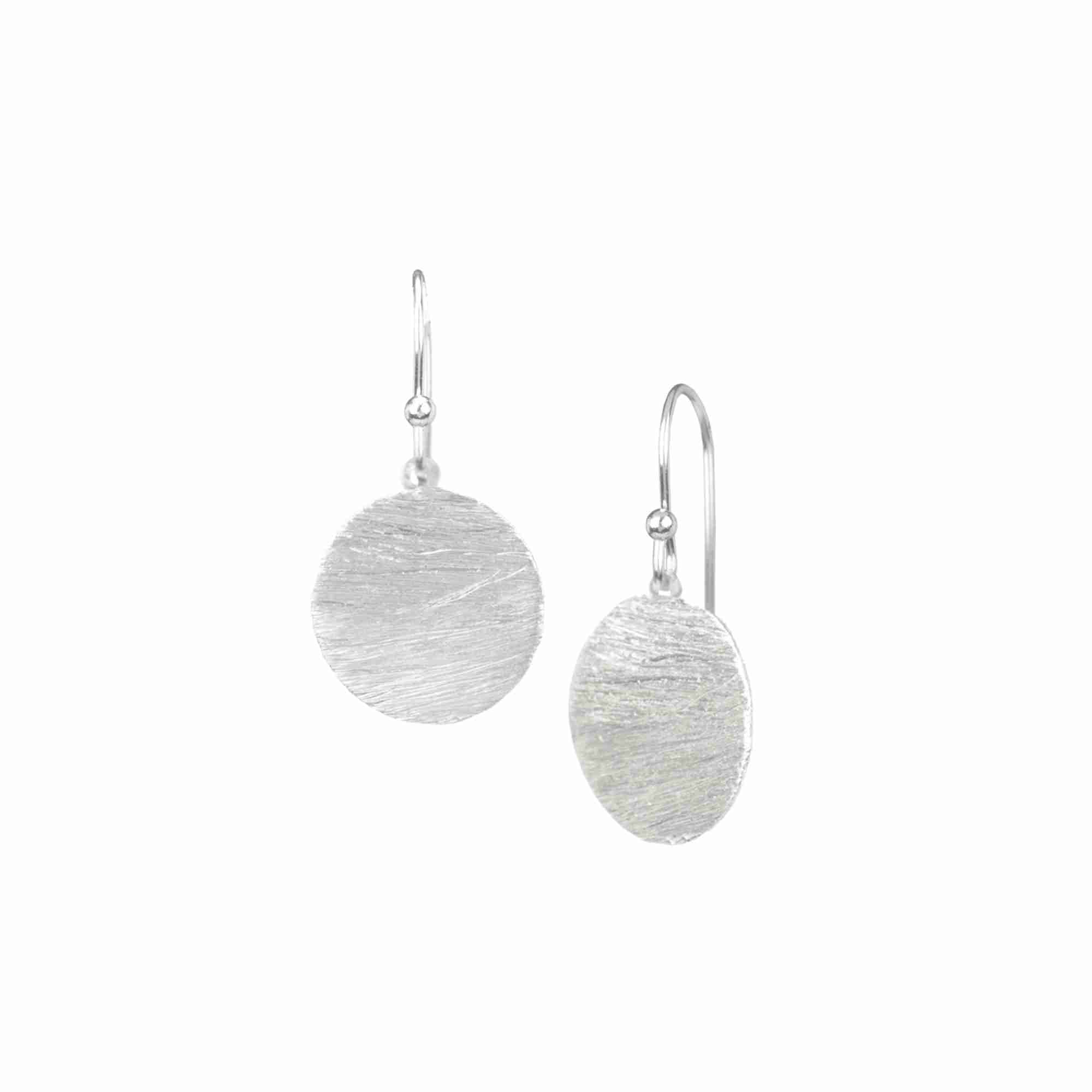 Shimmering Disks Silver Medium Drop Earrings; minimalist circular coin drops with a signature brushed-satin 92.5 recycled silver finish.