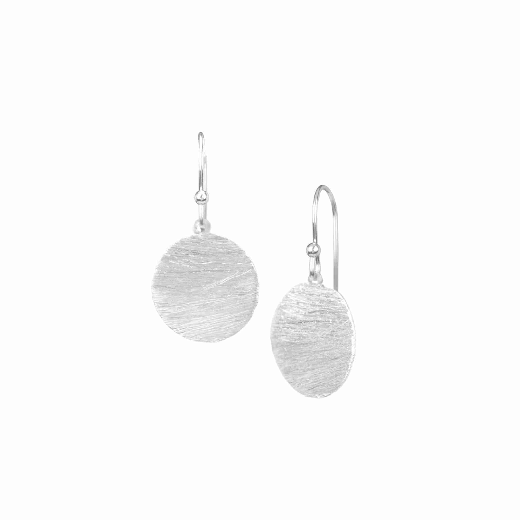 Shimmering Disks Silver Medium Drop Earrings; minimalist circular coin drops with a signature brushed-satin 92.5 recycled silver finish.