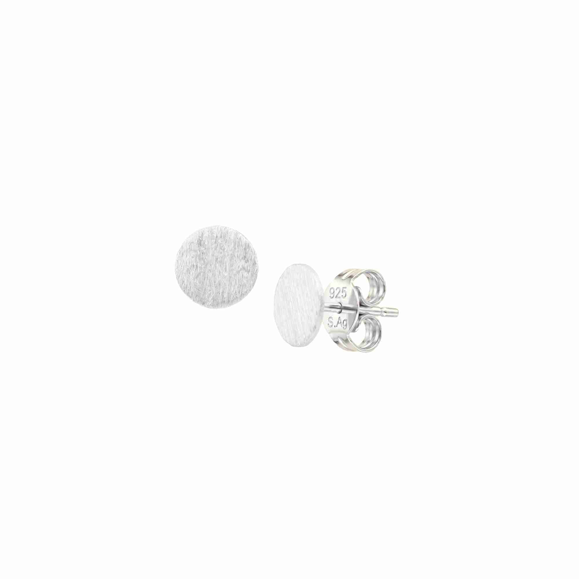 Shimmering Disks Silver Studs; minimalist circular earrings with a signature brushed-satin 92.5 recycled silver finish.