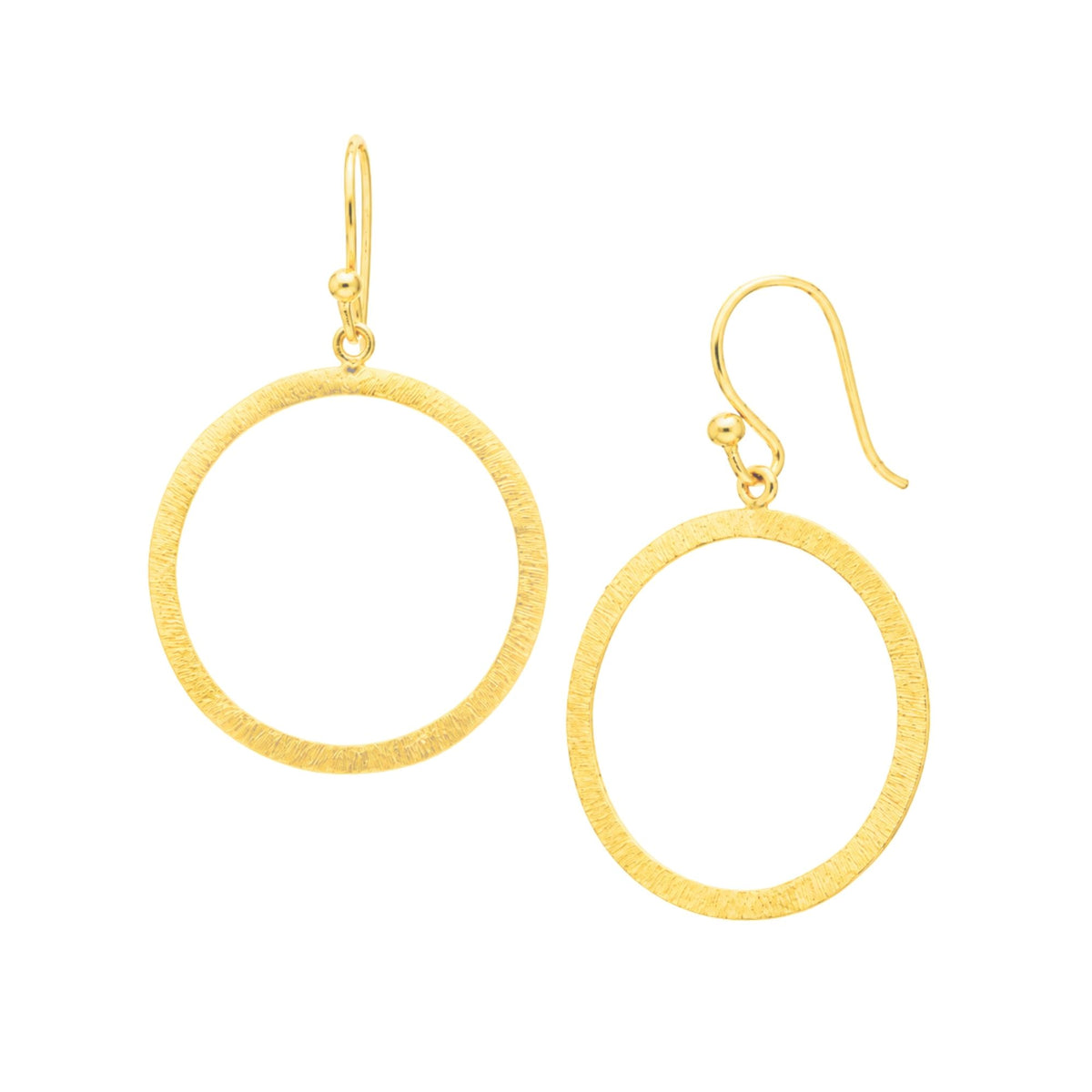 Open circle drop earrings in gold with a hand-brushed finish on a white background