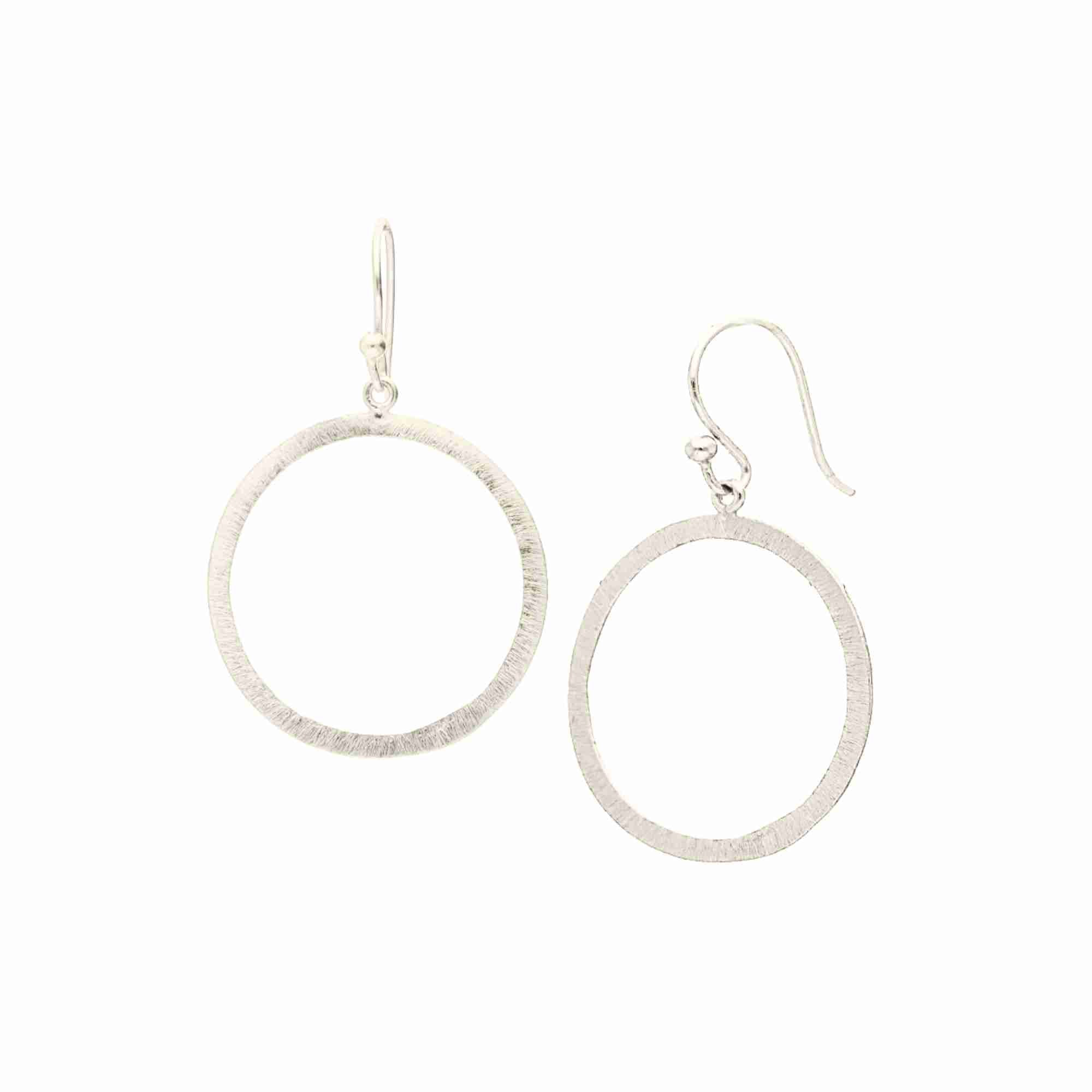 Shimmering Disks Open Circle Drop Earrings Silver — 44mm open-circle drop with hand-applied cross-hatch scratch finish in 92.5 recycled sterling silver by Protsaah Zurich.