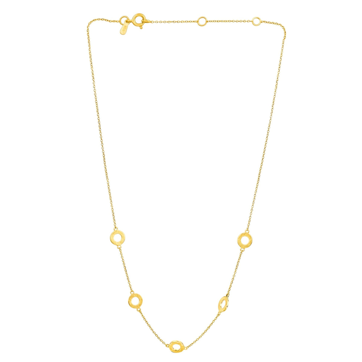 Open circles necklace in gold with five hand-brushed open circles on a fine chain on a white background