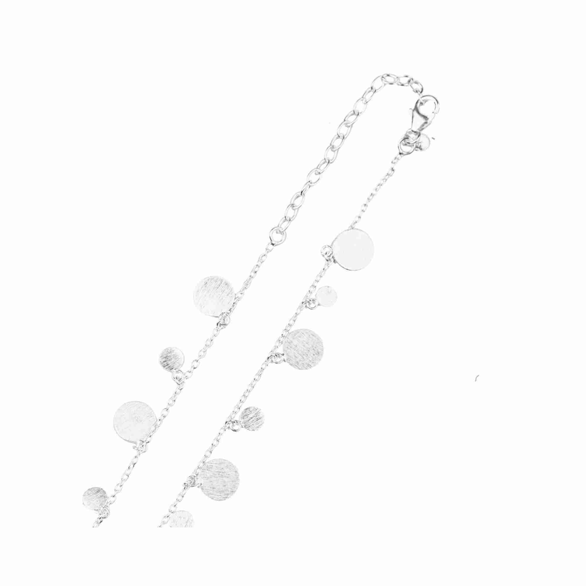 Isolated product shot named Shimmering Disks (67).jpg highlighting the lobster clasp fastener, extender links, and fine metalwork of the Shimmering Disks Scattered Statement Necklace Silver against a solid white background by Protsaah Zurich.