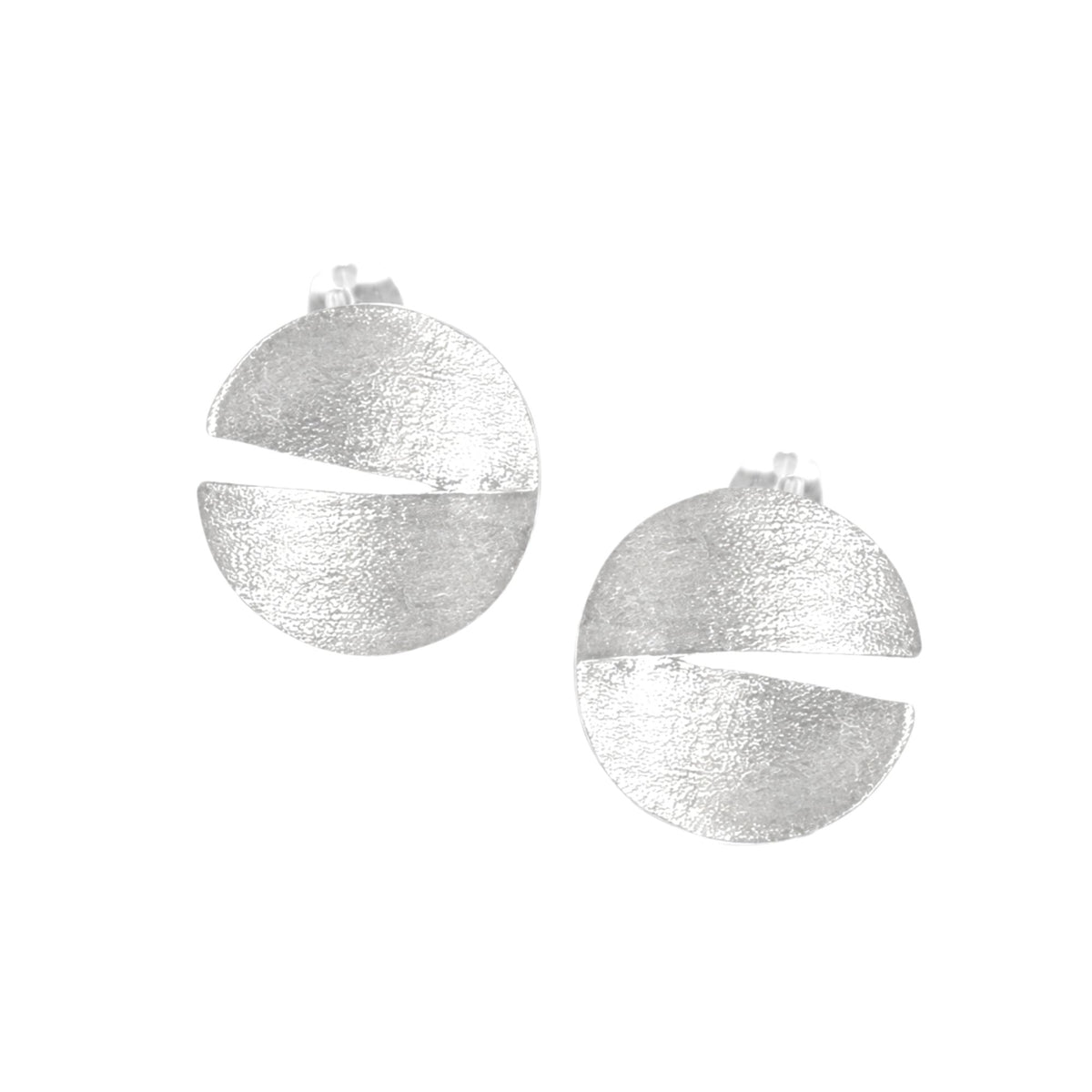 Sculptural split-disc stud earrings in silver with a hand-brushed finish on a white background