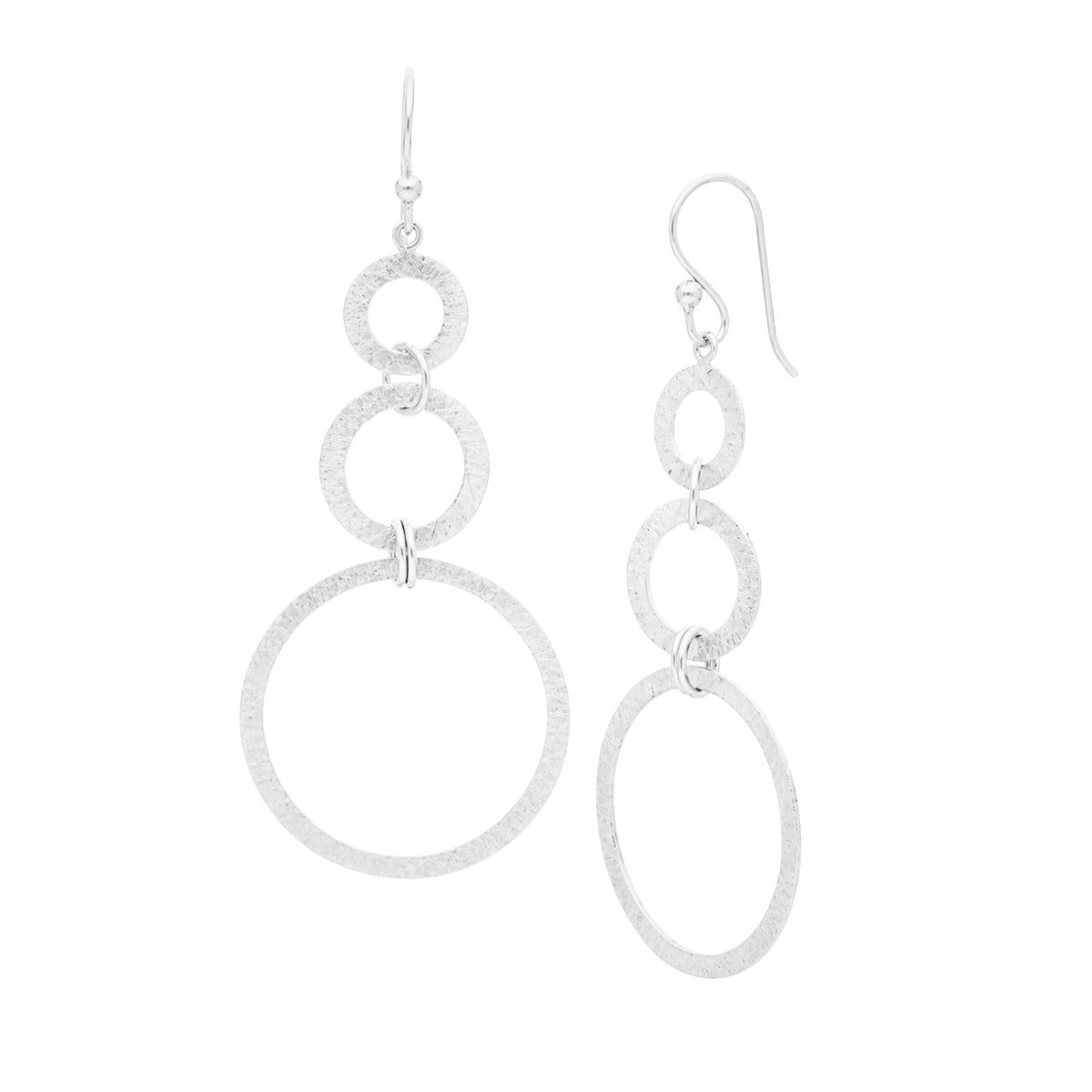Triple Circle Drop statement earrings in silver with a hand-brushed finish on a white background