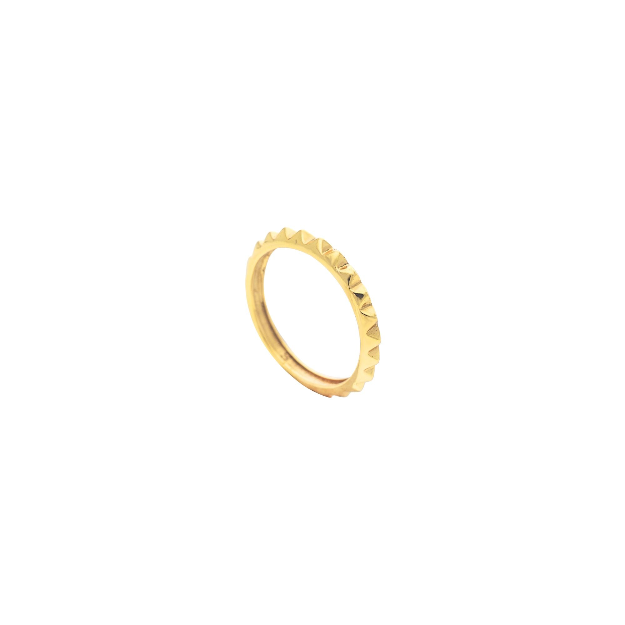 Geo Glam Studded Eternity Band Ring in 22K gold-plated recycled 925 sterling silver showing an angled perspective view of the continuous pyramid-studded band.