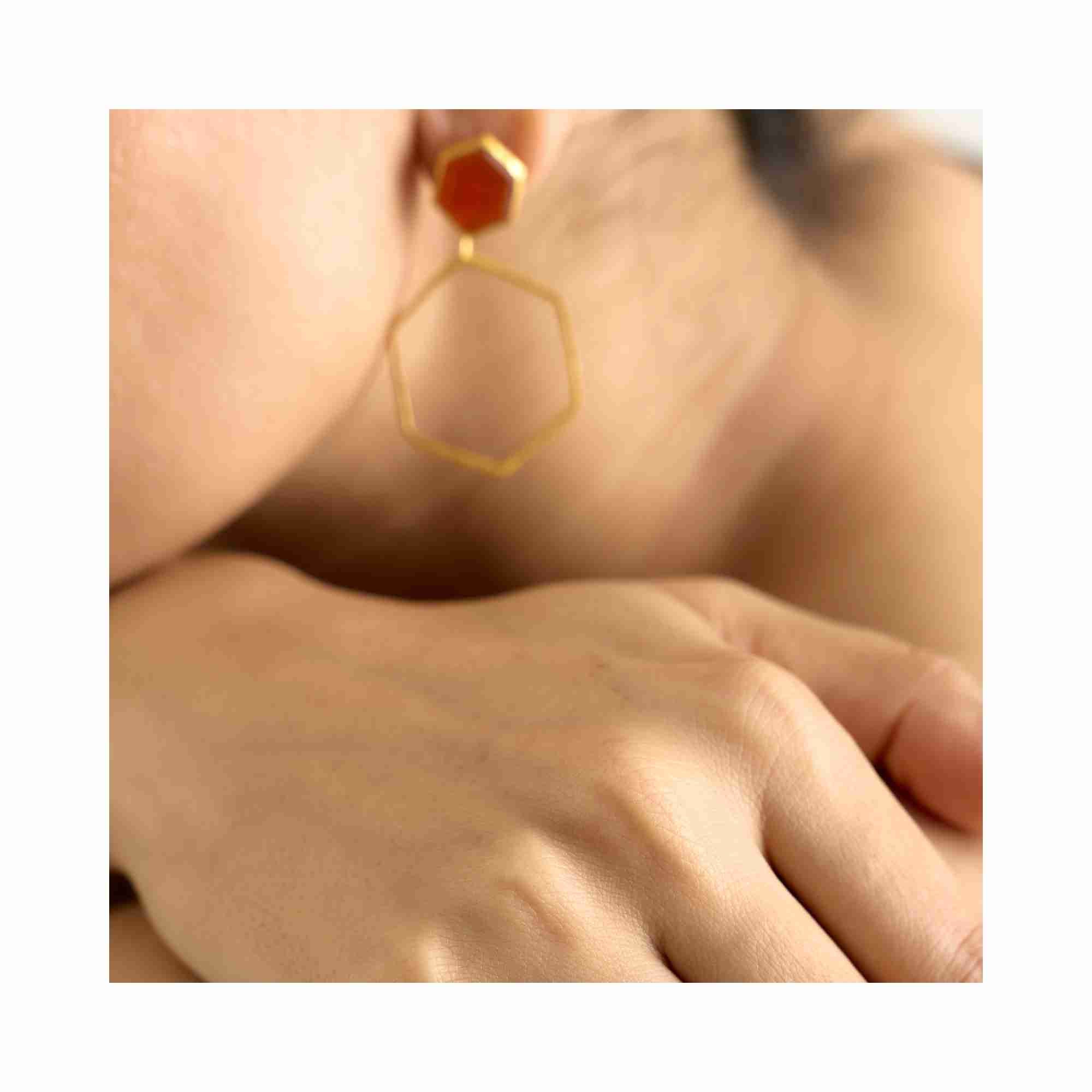 Side view of Geo Glam Hexagonal Carnelian Statement Earrings Gold — open hexagonal frame with warm orange carnelian in 22K gold vermeil by Protsaah Zurich.
