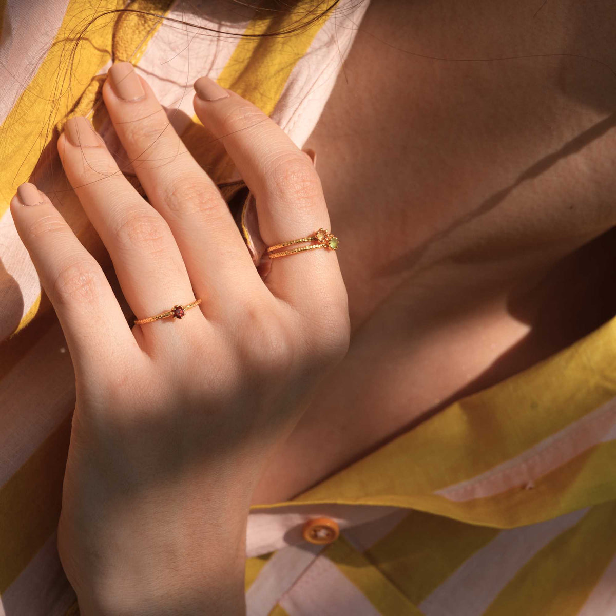 Delicate Vintage Aqua Chalcedony Dotted Band Ring Gold — Hand wearing a gold ring with an aqua chalcedony gemstone. By Protsaah Zurich.