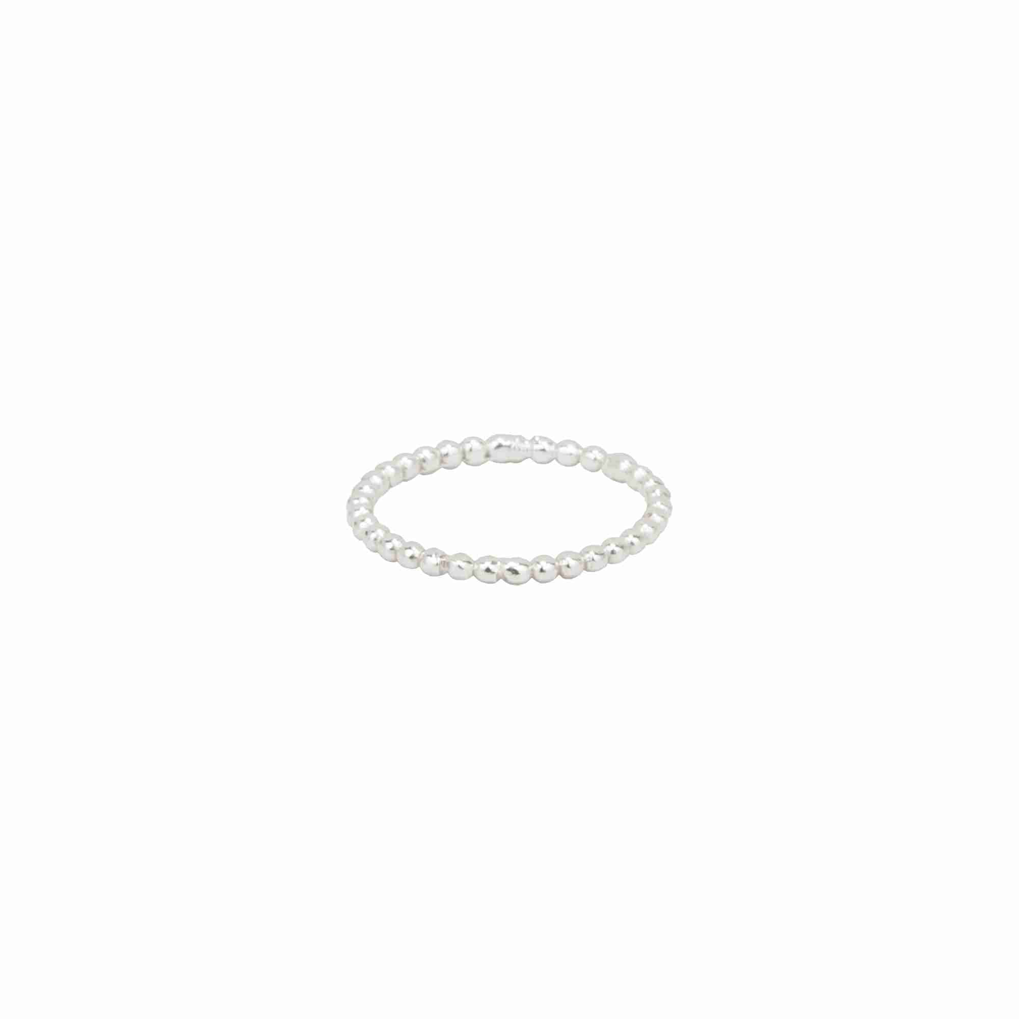

Delicate Vintage Beaded Stacking Ring Silver — a thin silver band with a spherical beaded texture for stacking by Protsaah Zurich.
