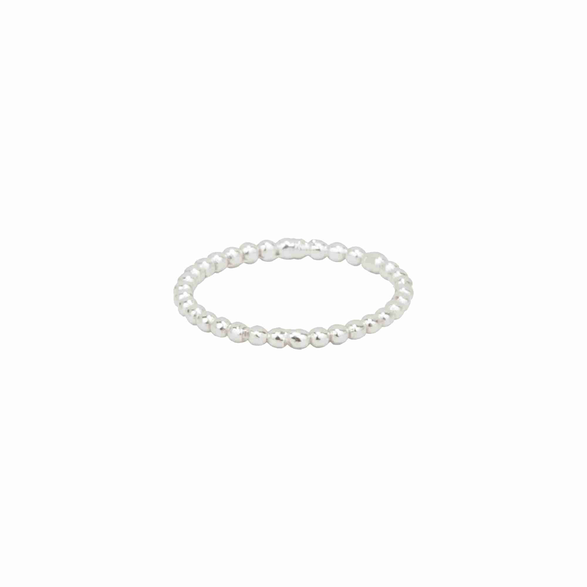 Delicate Vintage Beaded Stacking Ring Silver — a thin silver band with a spherical beaded texture for stacking by Protsaah Zurich.