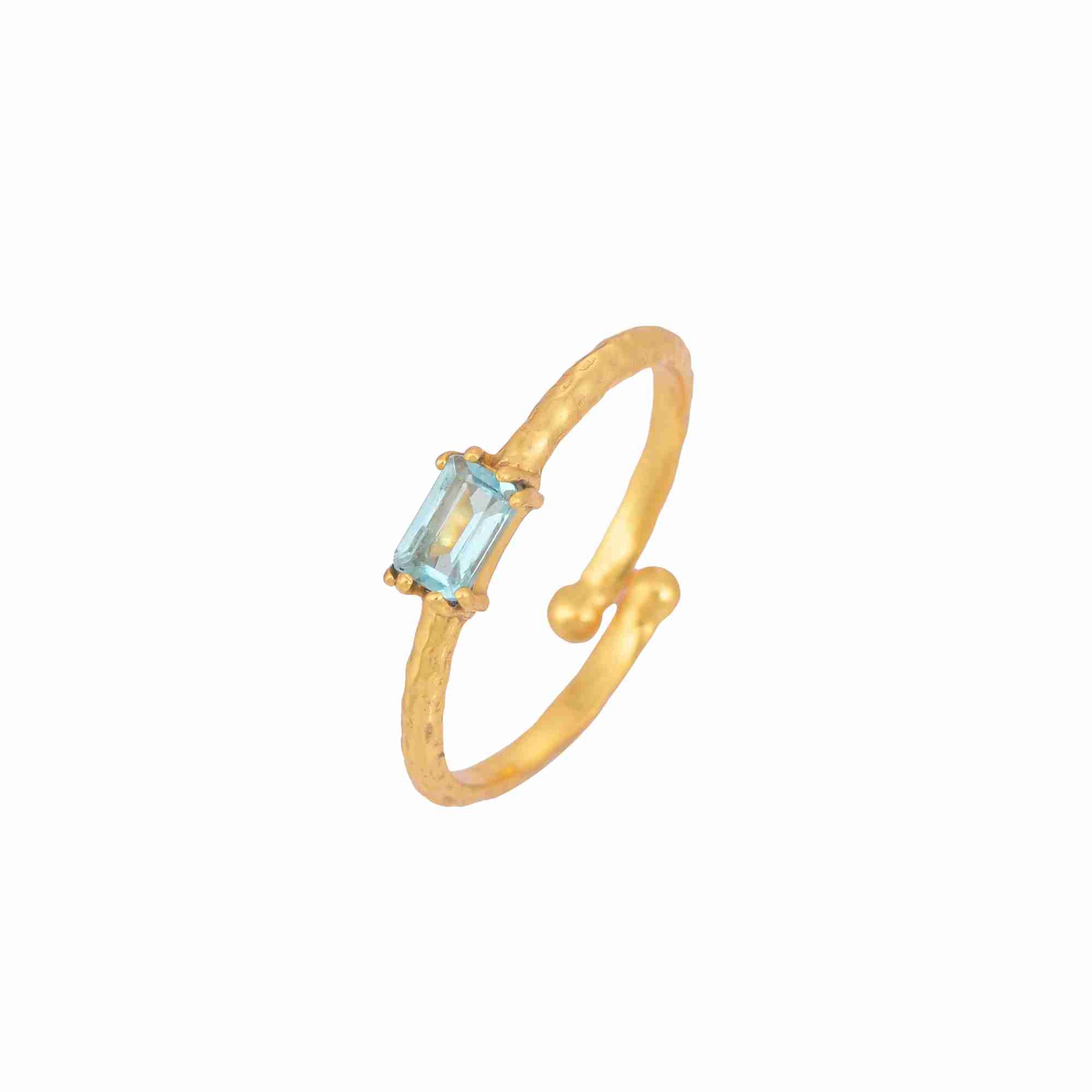 Delicate Vintage Blue Topaz Baguette Ring Gold — an adjustable 22K gold vermeil bypass ring featuring a horizontally set step-cut baguette blue topaz on a 1.3 mm hammered texture band by Protsaah Zurich.