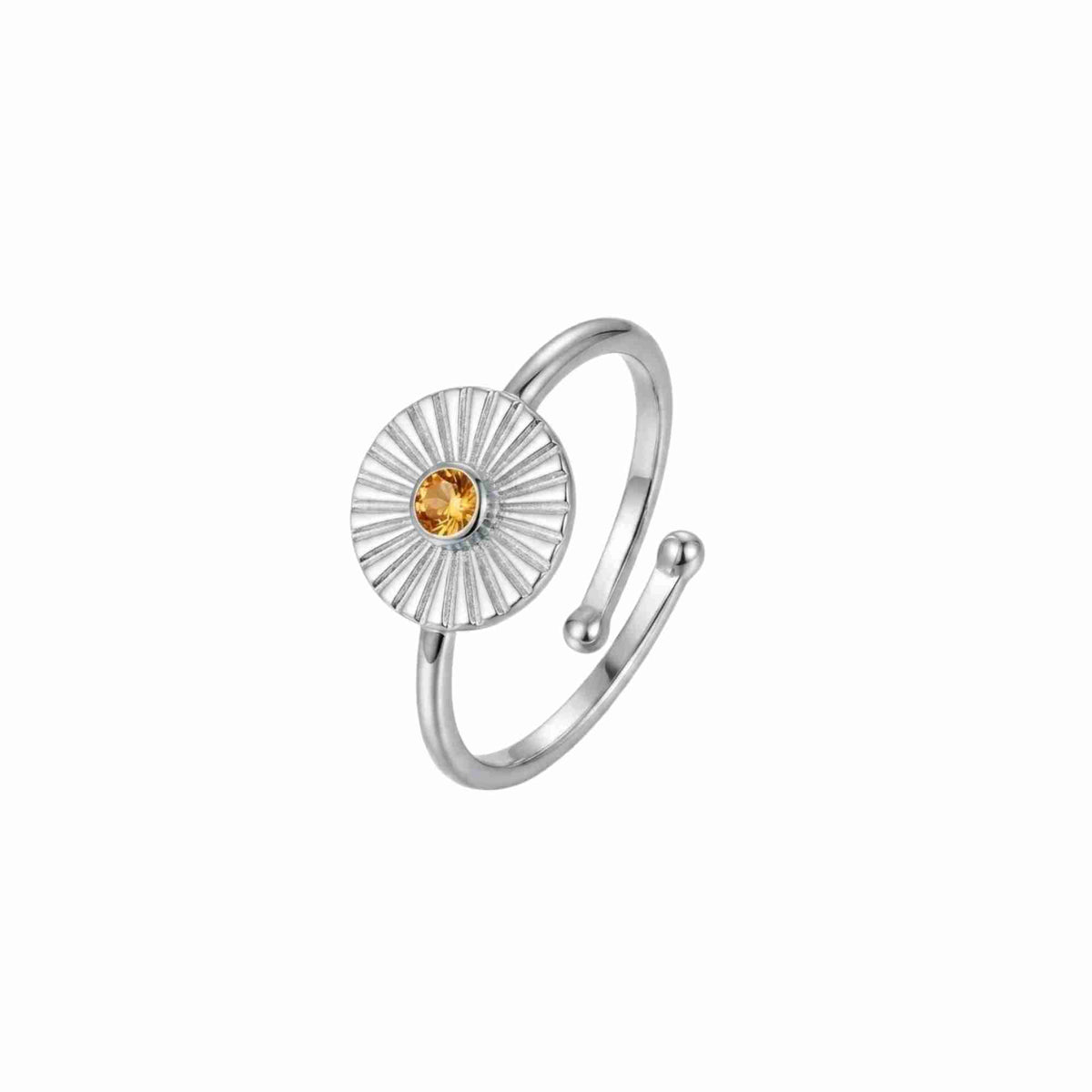 Three-quarter angled view of Delicate Vintage Citrine Fluted Medallion Coin Ring in 925 silver, featuring a sunburst fluted coin medallion set with a round yellow citrine gemstone on an open adjustable band.