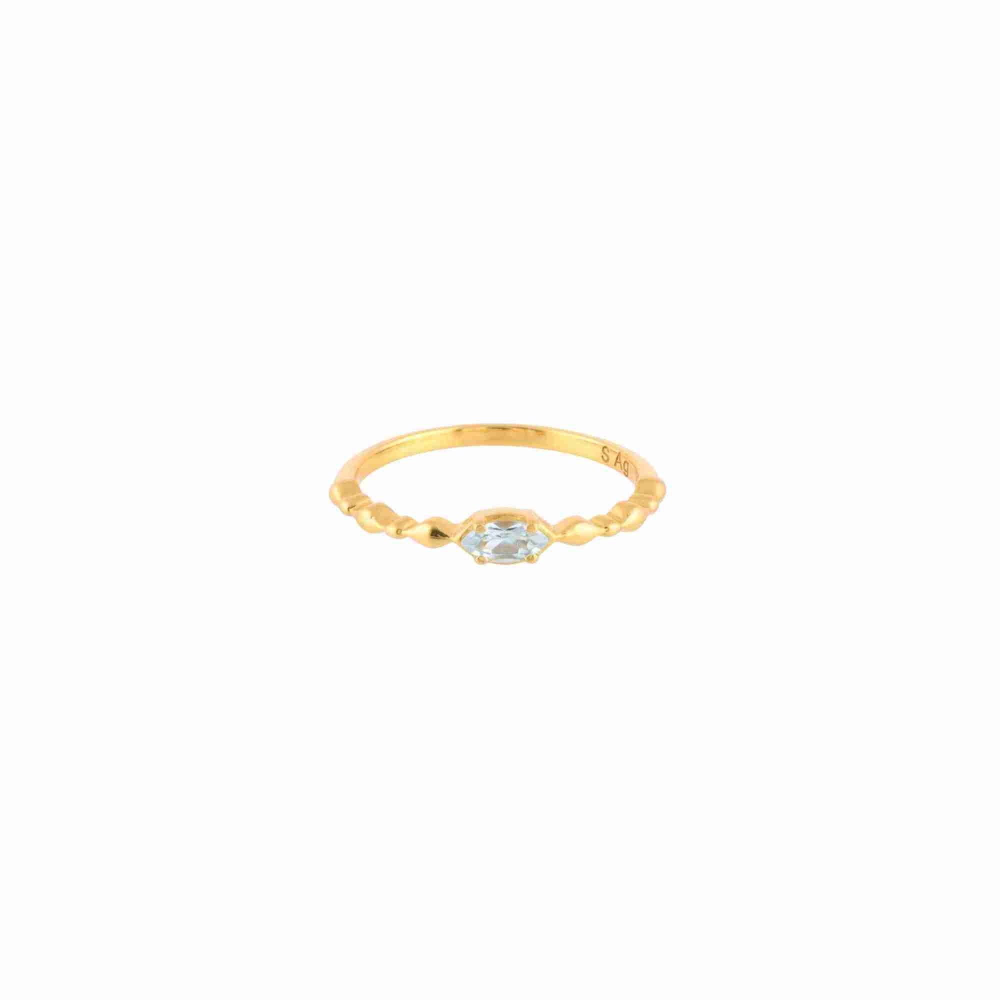 Delicate Vintage Dainty Marquise Blue Topaz Ring Gold featuring a marquise-cut Blue Topaz gemstone on a delicate textured band.