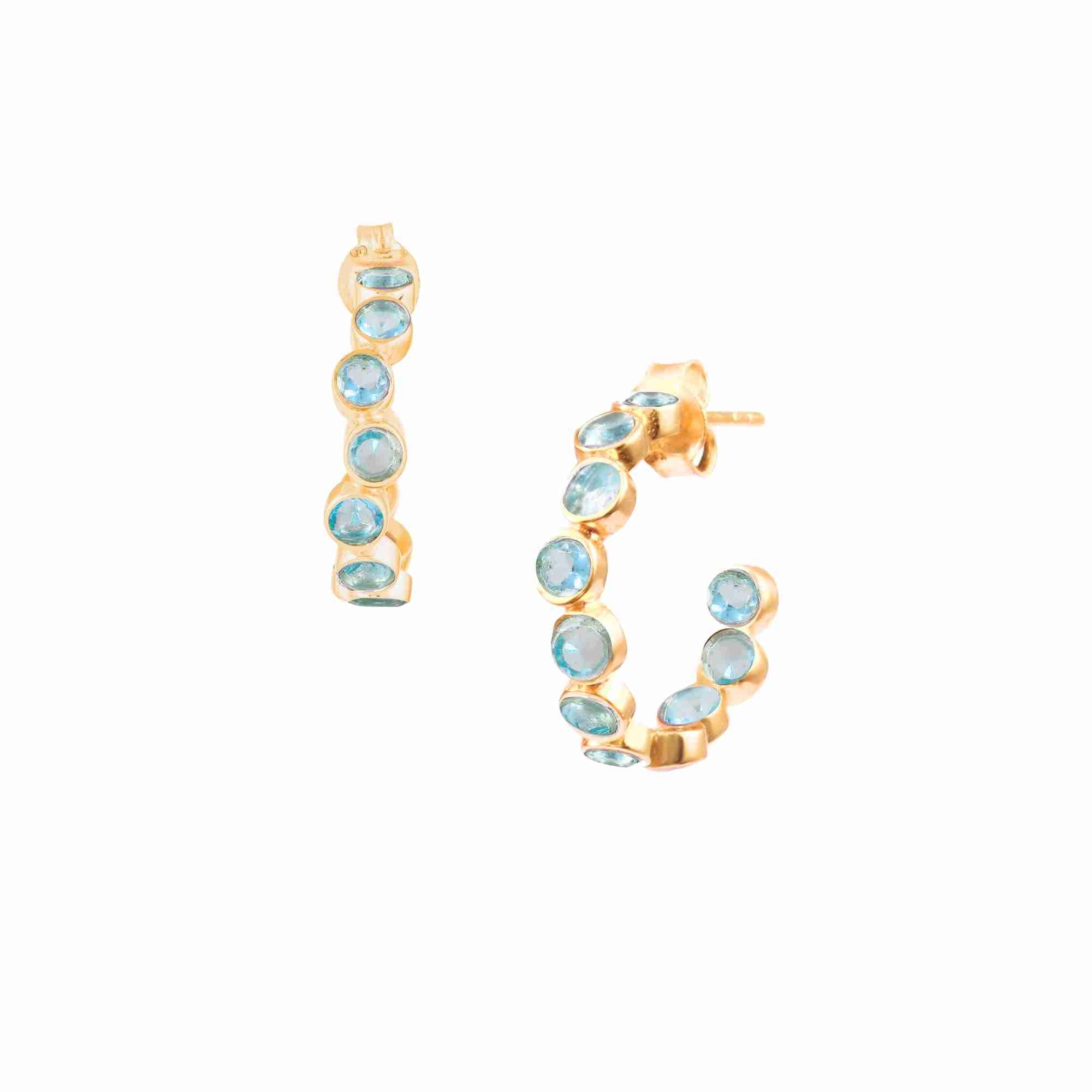 Dew Drops Blue Topaz Studded Hoops Earrings Gold — elegant 22K gold vermeil open-circle hoop earrings featuring a continuous outer row of bezel-set round natural bright blue topaz gemstones by Protsaah Zurich.