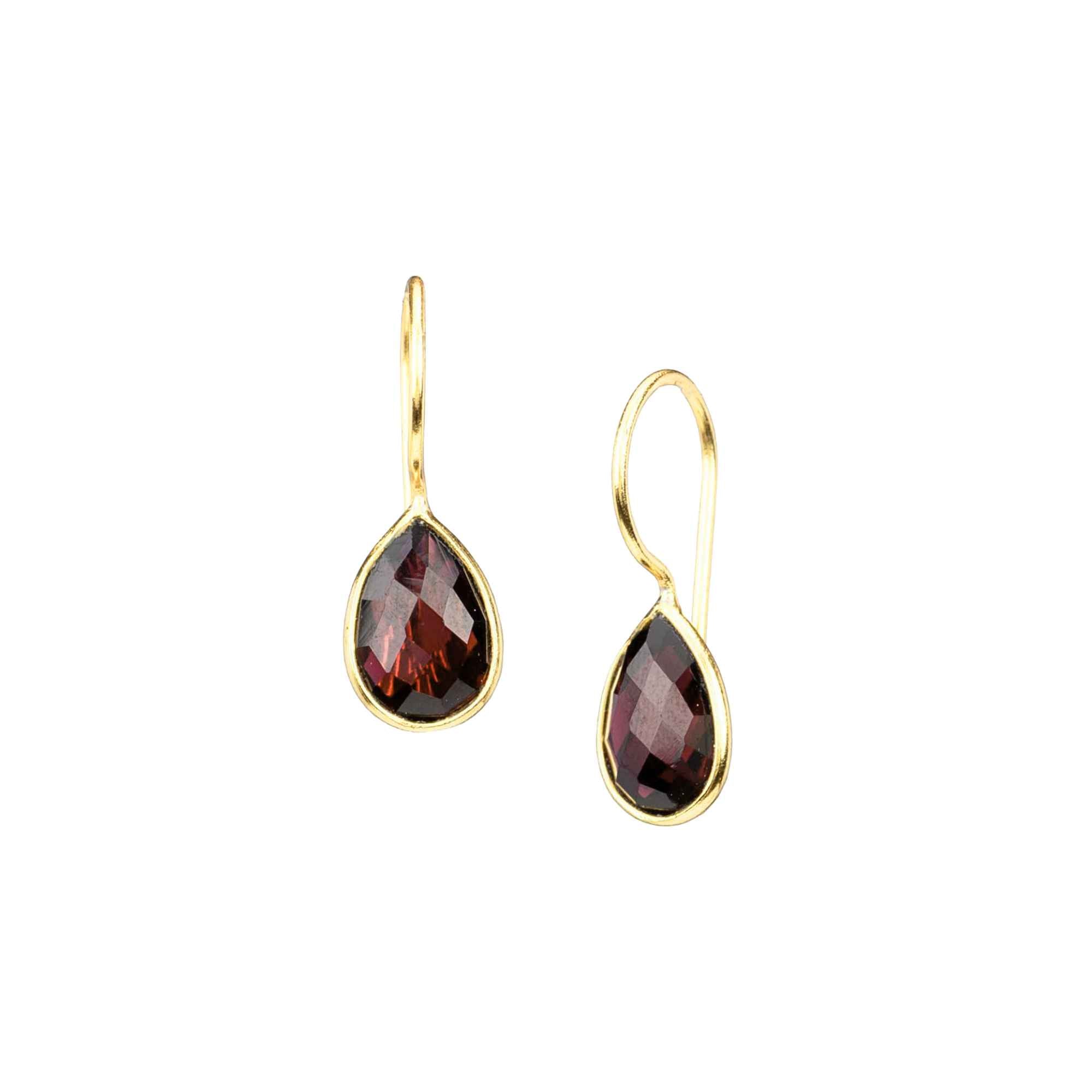 A pair of gold teardrop drop earrings with faceted deep red garnet stones on a sleek continuous curved ear hook in high-shine 22K gold finish. It is in gold bezel setting with french wire hooks, studio shot on white background — Protsaah.