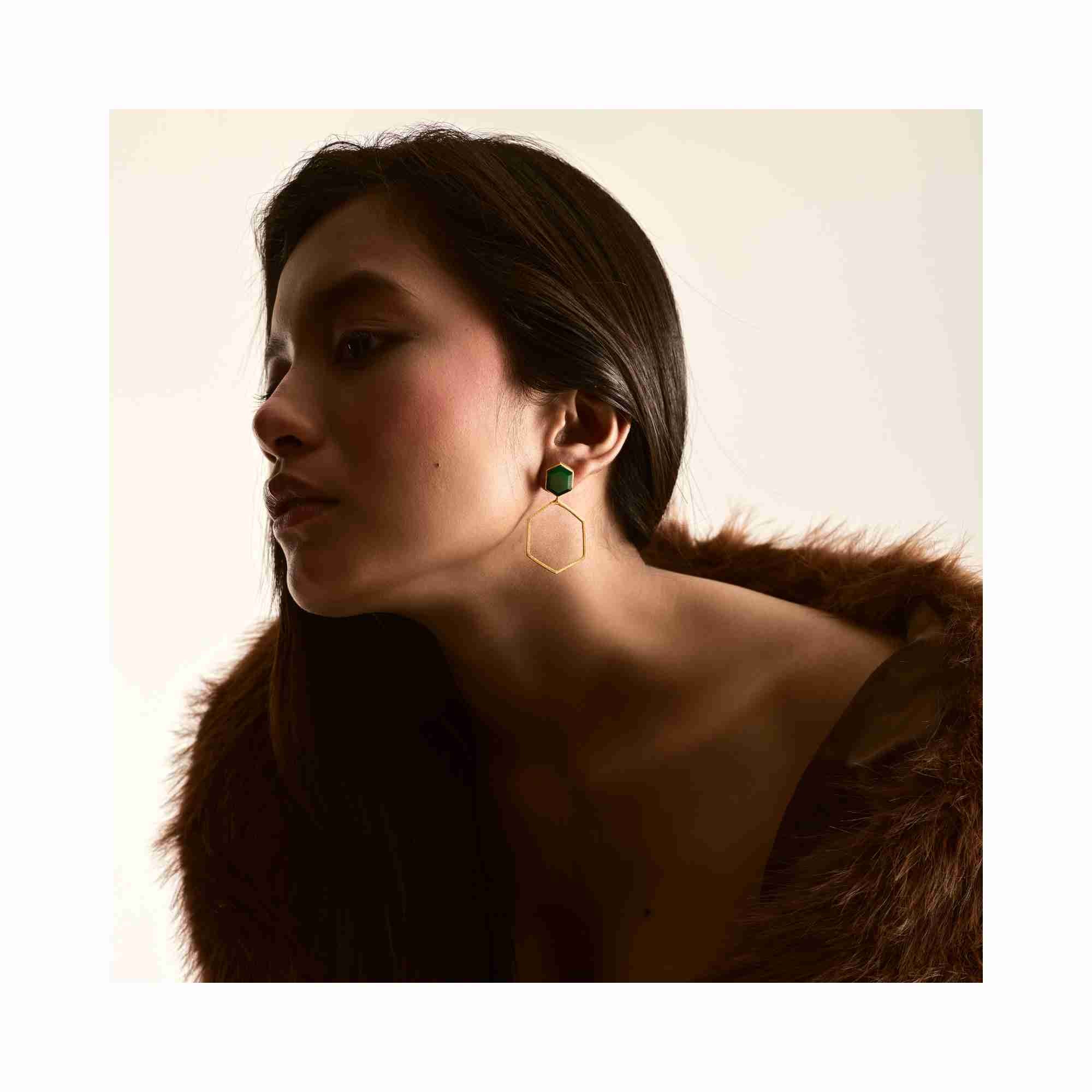 Side view of Geo Glam Hexagonal Green Onyx Statement Earrings Gold — open hexagonal frame with vibrant green onyx in 22K gold vermeil by Protsaah Zurich.