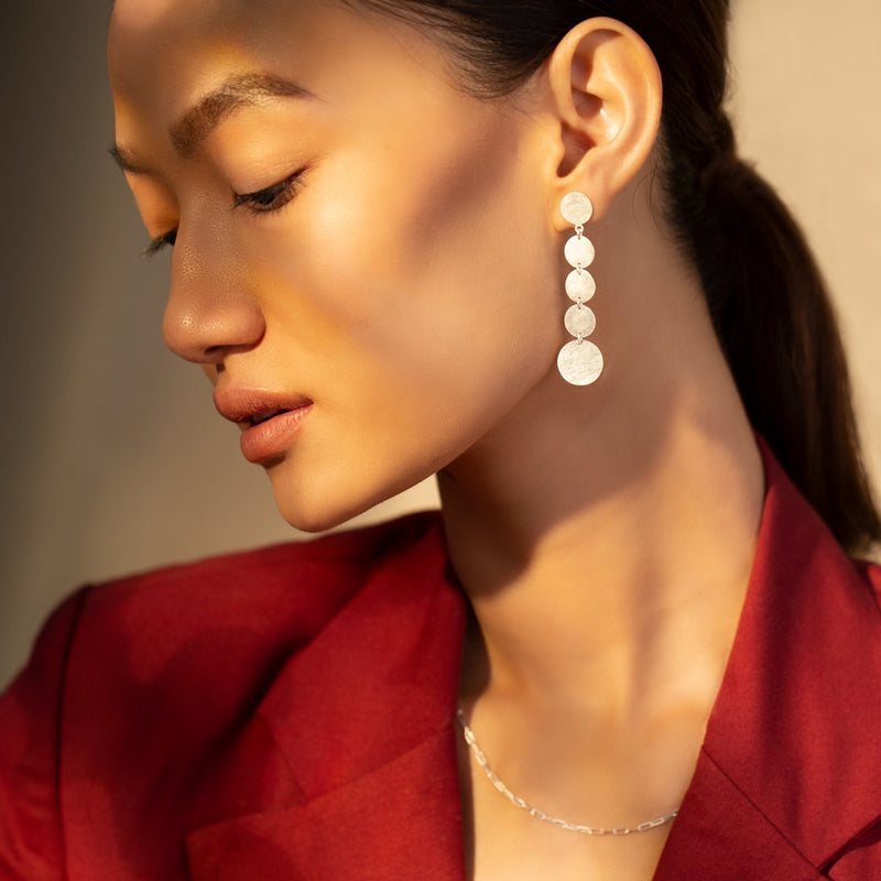 Shimmering Disks Graduating Statement Earrings Silver