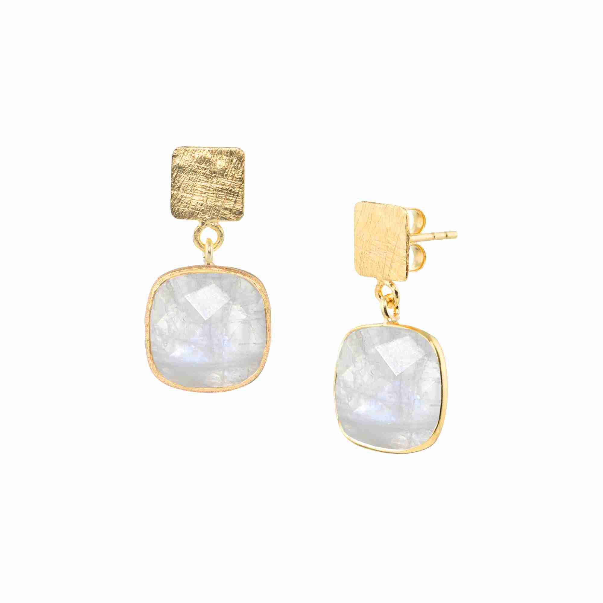 Product photography of Geo Glam Cushion-Cut Rainbow Moonstone Drop Earrings Gold, highlighting the faceted square iridescent white gemstone suspended from a hand-textured matte gold square post — Protsaah Zurich.
