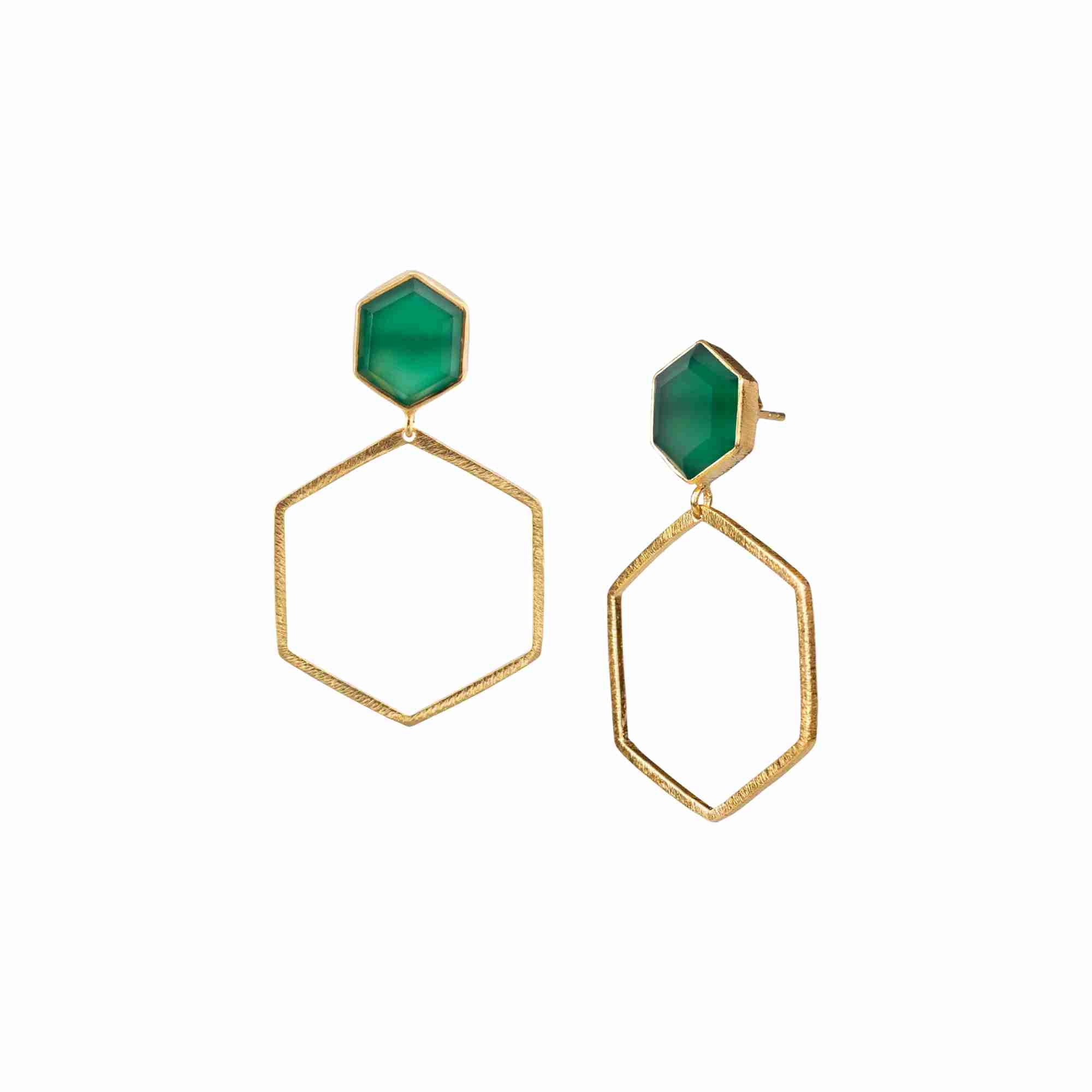 Product photography of Geo Glam Hexagonal Green Onyx Statement Earrings Gold, highlighting the faceted emerald-green gemstone suspended inside a large, open hexagonal drop frame below a hand-textured matte gold post — Protsaah Zurich.