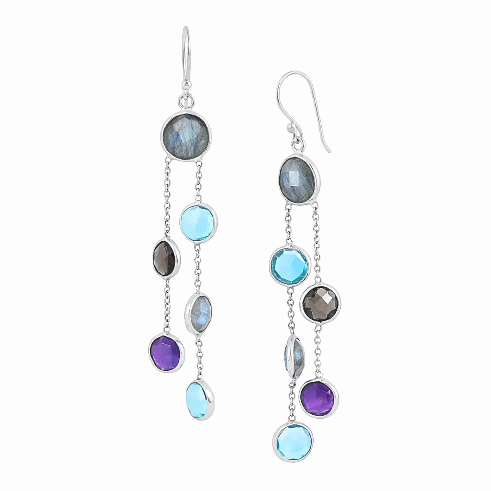 Product picture named Kaleidoscope Aura displaying a front and dynamic profile view of the Multi-Stone Silver Heirloom Earrings on French hooks against a plain white background, showcasing a double-strand tiered dangle design in 92.5 recycled silver set with bezel-wrapped round and oval Labradorite, bright Blue Topaz, faceted Smoky Quartz, and vibrant purple Amethyst gemstones by Protsaah Zurich.