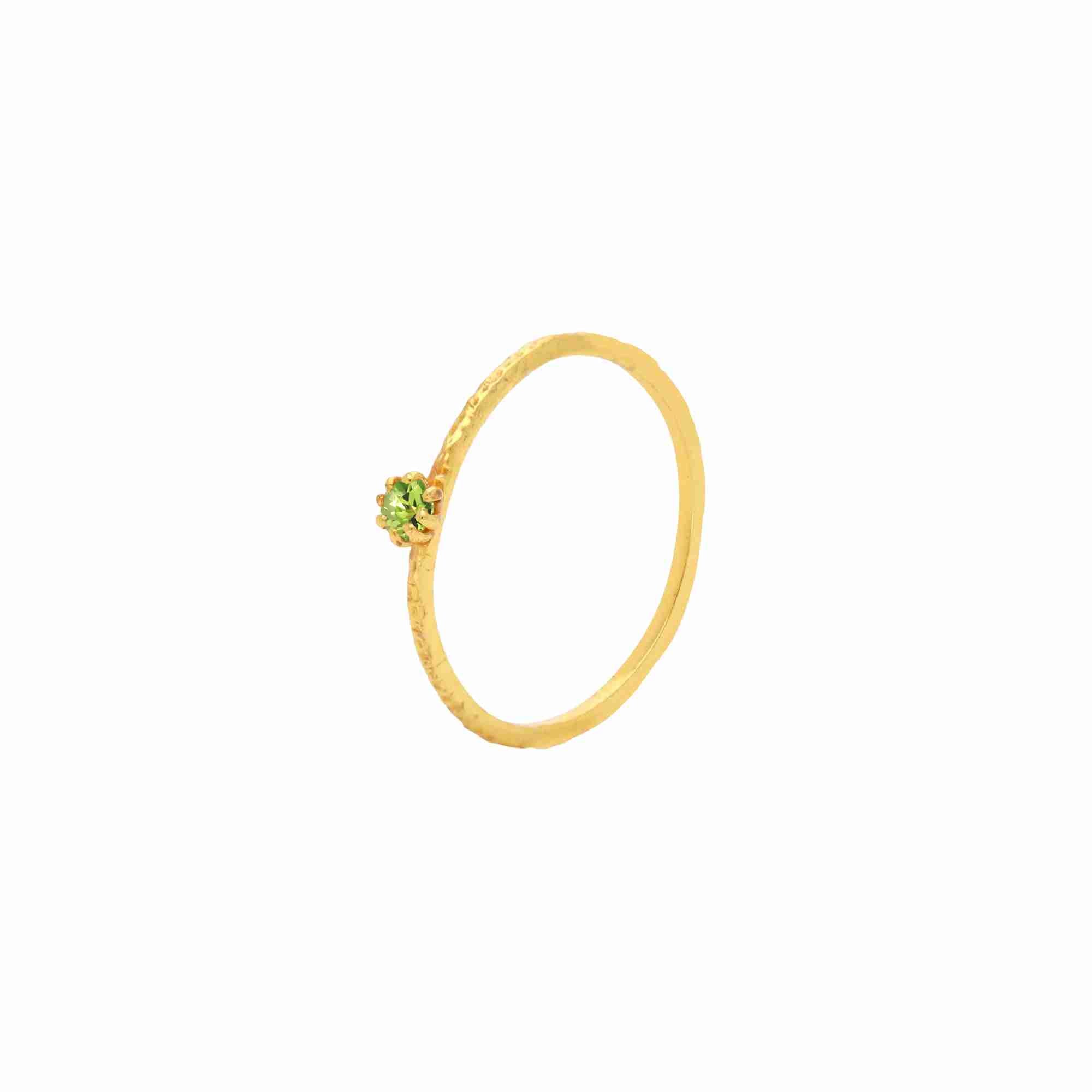 Protsaah Zurich - Kaleidoscope Aura Peridot hand-hammered gold solitaire ring shown from an angled profile, set in 22K gold-plated recycled sterling silver, handcrafted sustainable gemstone jewelry Switzerland.