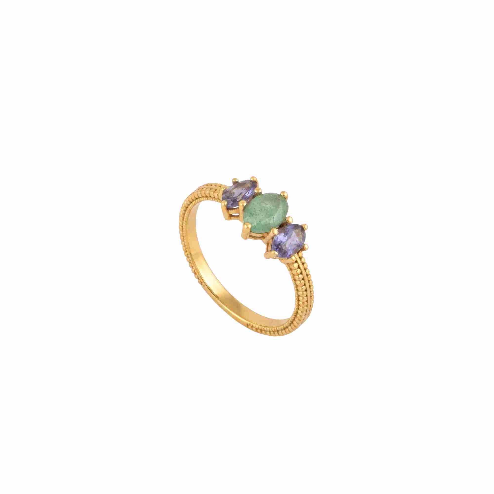 Studio product photography of the Protsaah Kaleidoscope Nephrite and Iolite Three-Stone Marquise Ring in Gold (SKU: RN-032-AU-NFR-IO), highlighting a central marquise-cut green nephrite stone flanked by two violet-blue iolite gems on a beaded 22K gold plated 925 Silver band.