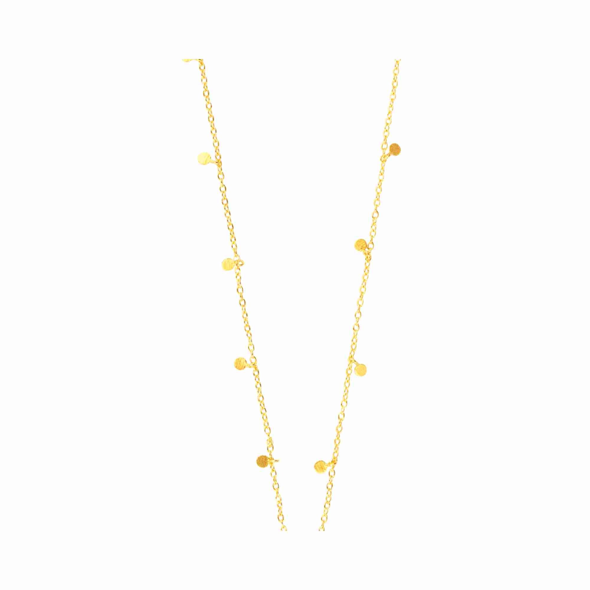 Editorial model photoshoot featuring the Shimmering Disks Constellation Disc Chain Necklace Gold, showcasing the elegant layering of circular disks in 22K gold vermeil for a modern, architectural look — Protsaah Zurich.