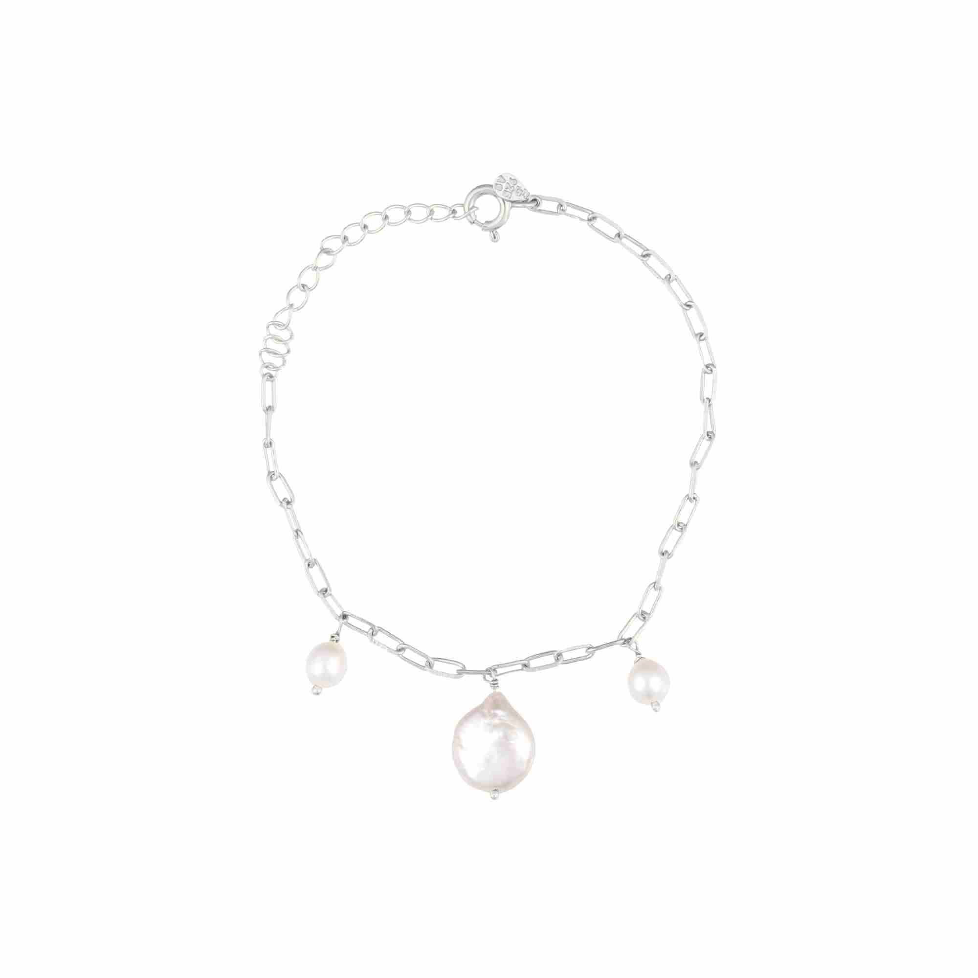 PEARLS GALORE Silver Pearl Bracelet; a delicate recycled silver chain bracelet featuring three white baroque pearls, handcrafted by Protsaah Zurich.