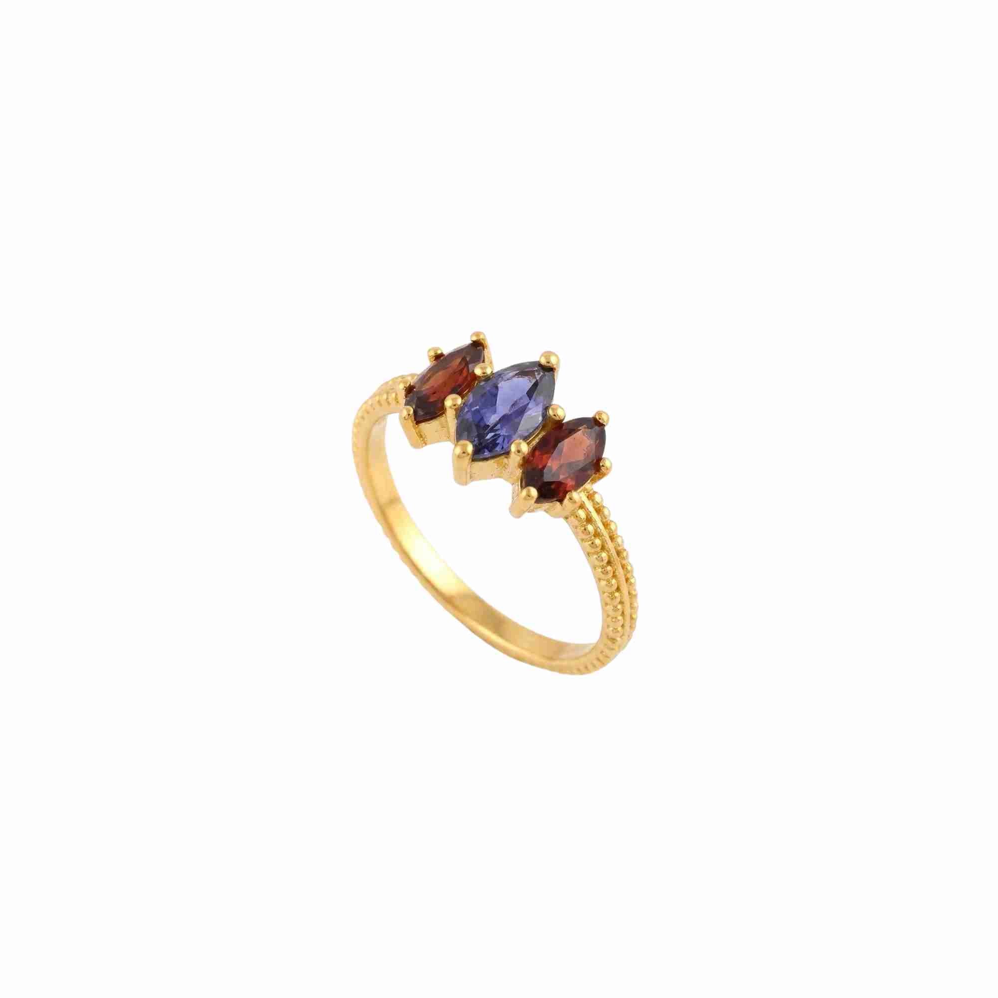 Side view of Kaleidoscope Iolite and Garnet Three-Stone Marquise Ring Gold — marquise iolite and garnet stones in 22K gold vermeil by Protsaah Zurich.