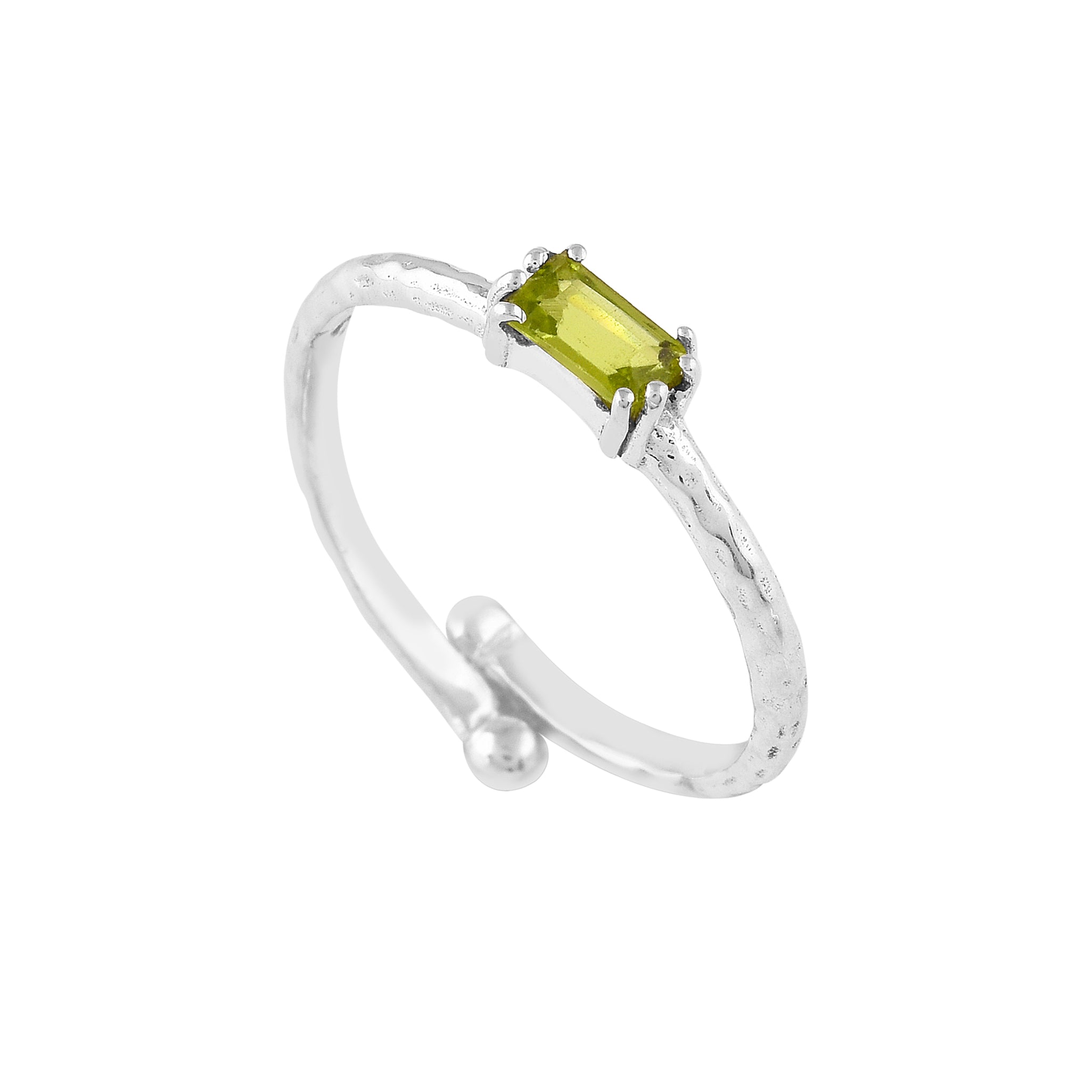Three-quarter angled view of the Delicate Vintage Peridot Baguette Ring Silver showcasing the four-prong setting, vibrant green baguette stone, and hammered open bypass band silhouette.