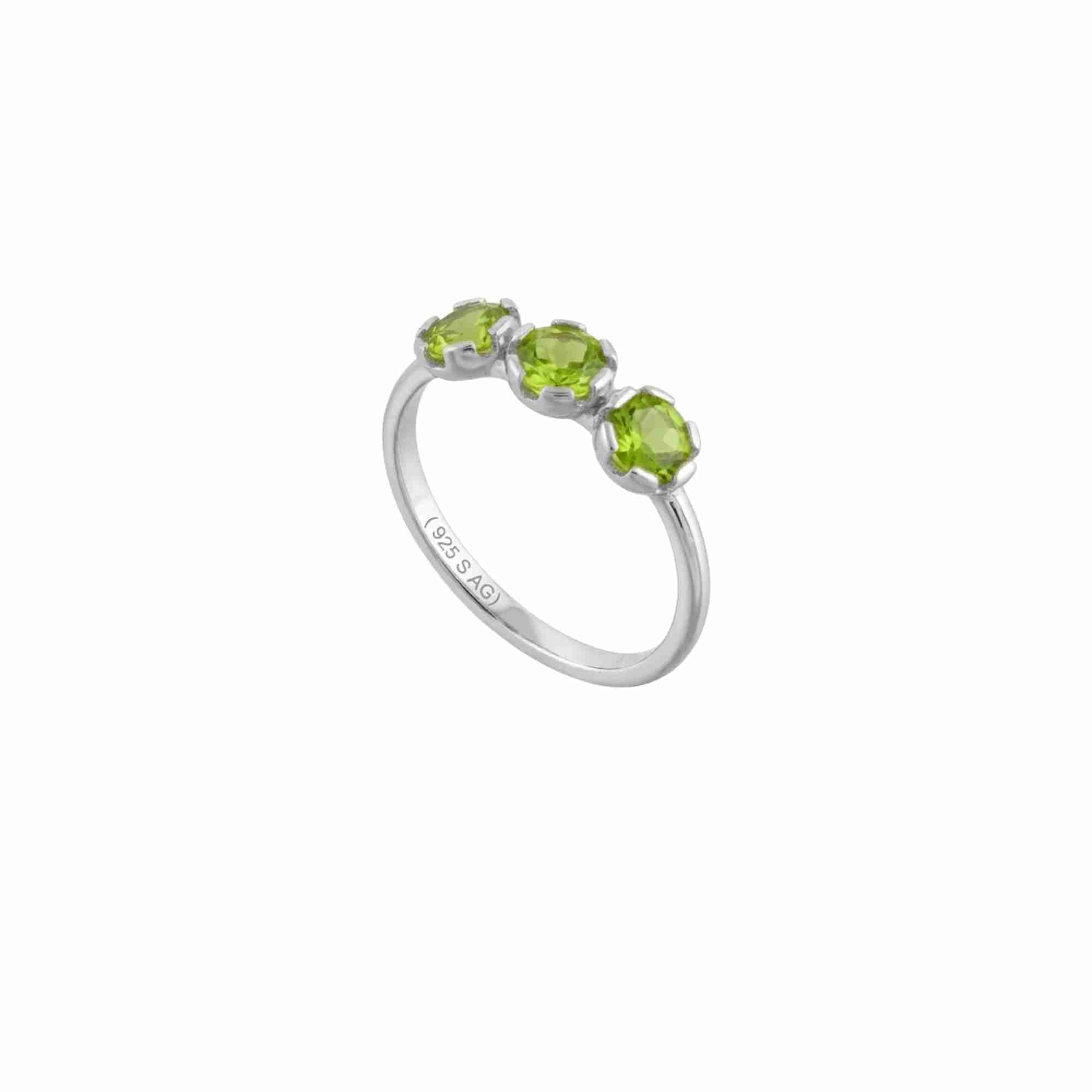 Three-quarter angled view of Delicate Vintage Peridot Trio Adjustable Ring in 925 silver showing the ring band, gemstone settings, and interior 925 S AG engraving.