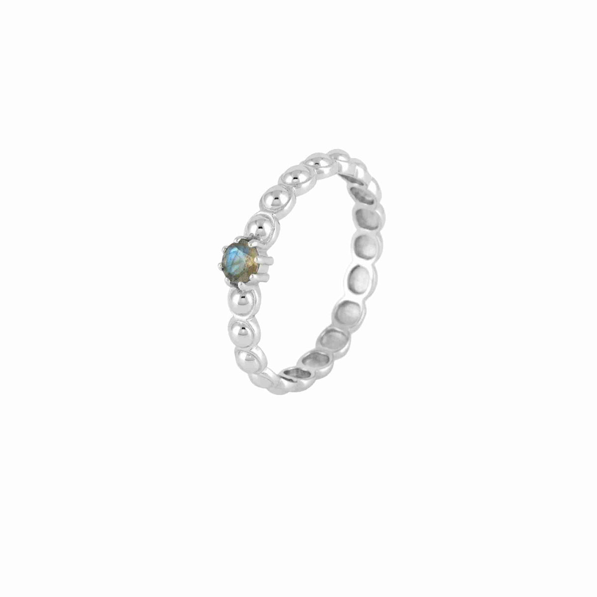 Three-quarter angled view of Delicate Vintage Labradorite Dotted Circle Ring in 925 silver showing the continuous beaded dotted band texture and the prong-set round labradorite gemstone.