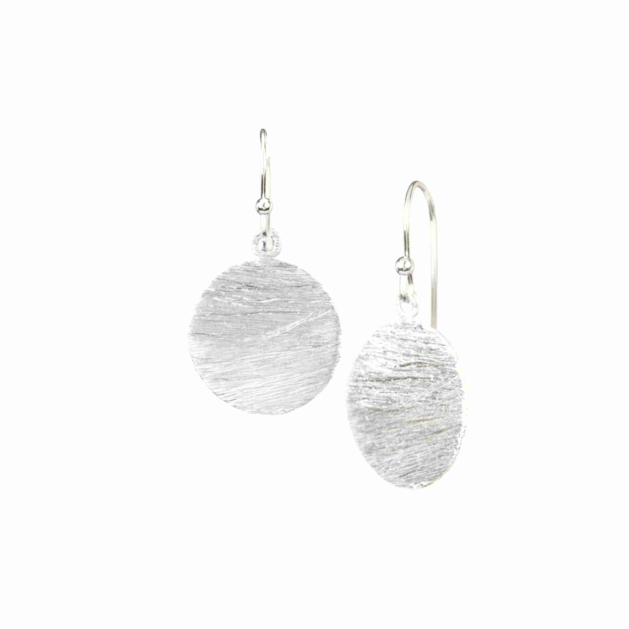 Shimmering Disks Silver Large Drop Earrings; minimalist circular coin drops with a signature brushed-satin 92.5 recycled silver finish.